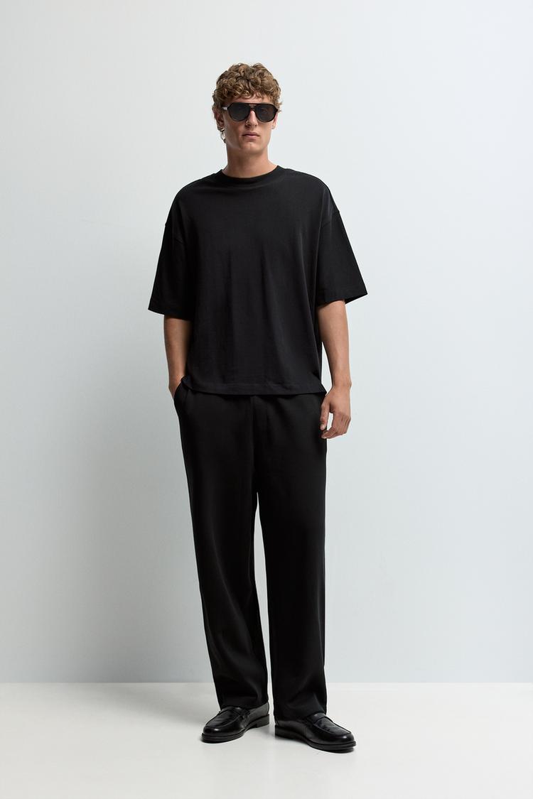 Interlock baggy trousers — BLACK