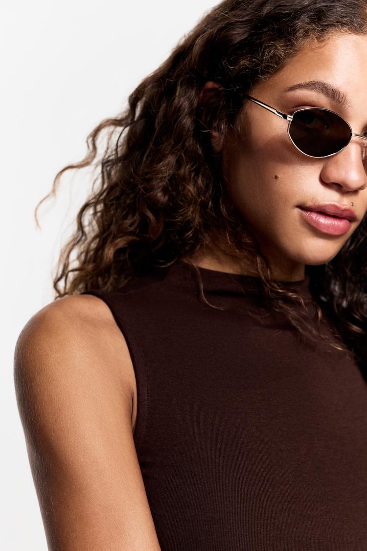 Irregular oval metallic sunglasses — GOLD