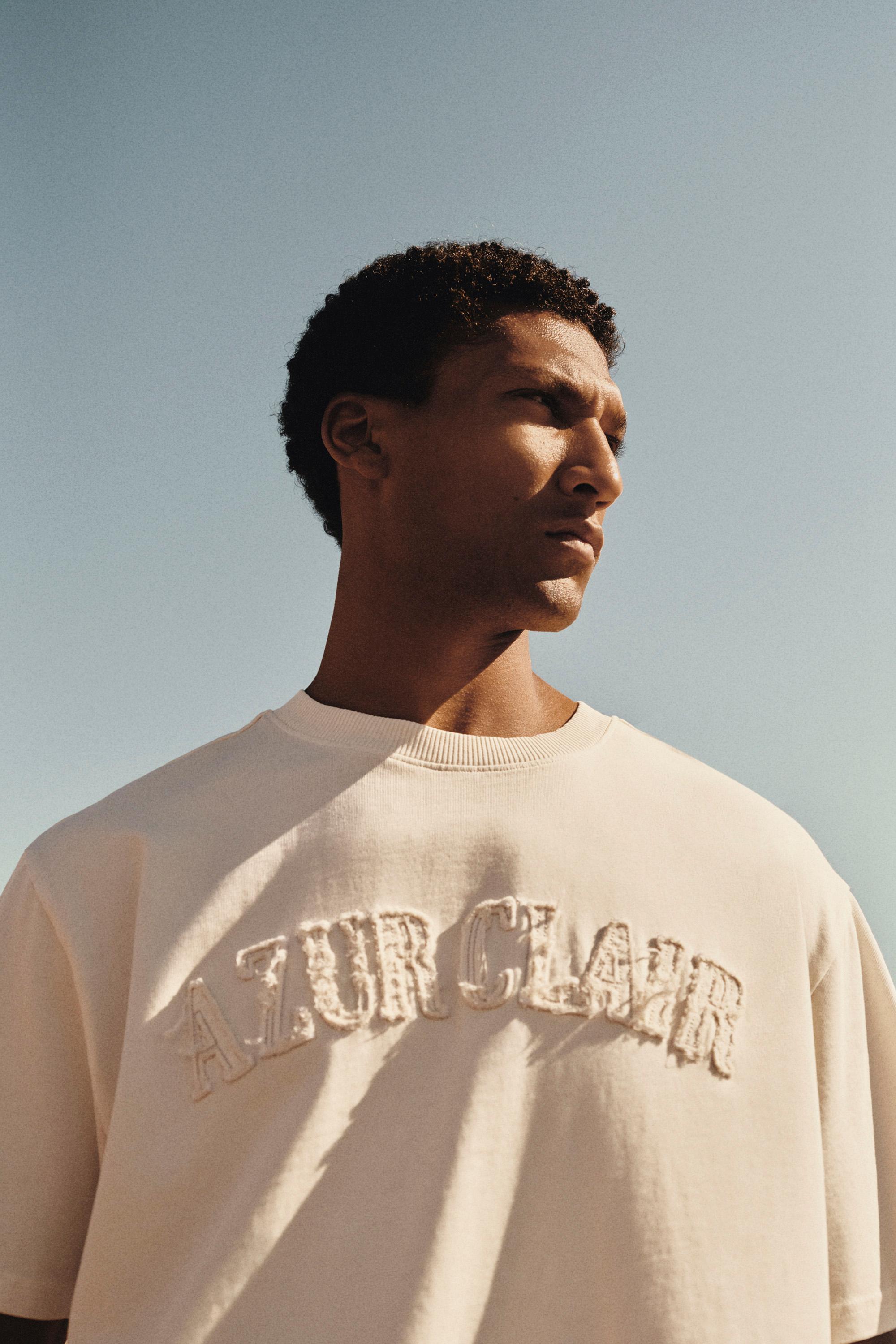 Slogan patch T-shirt — BUTTER