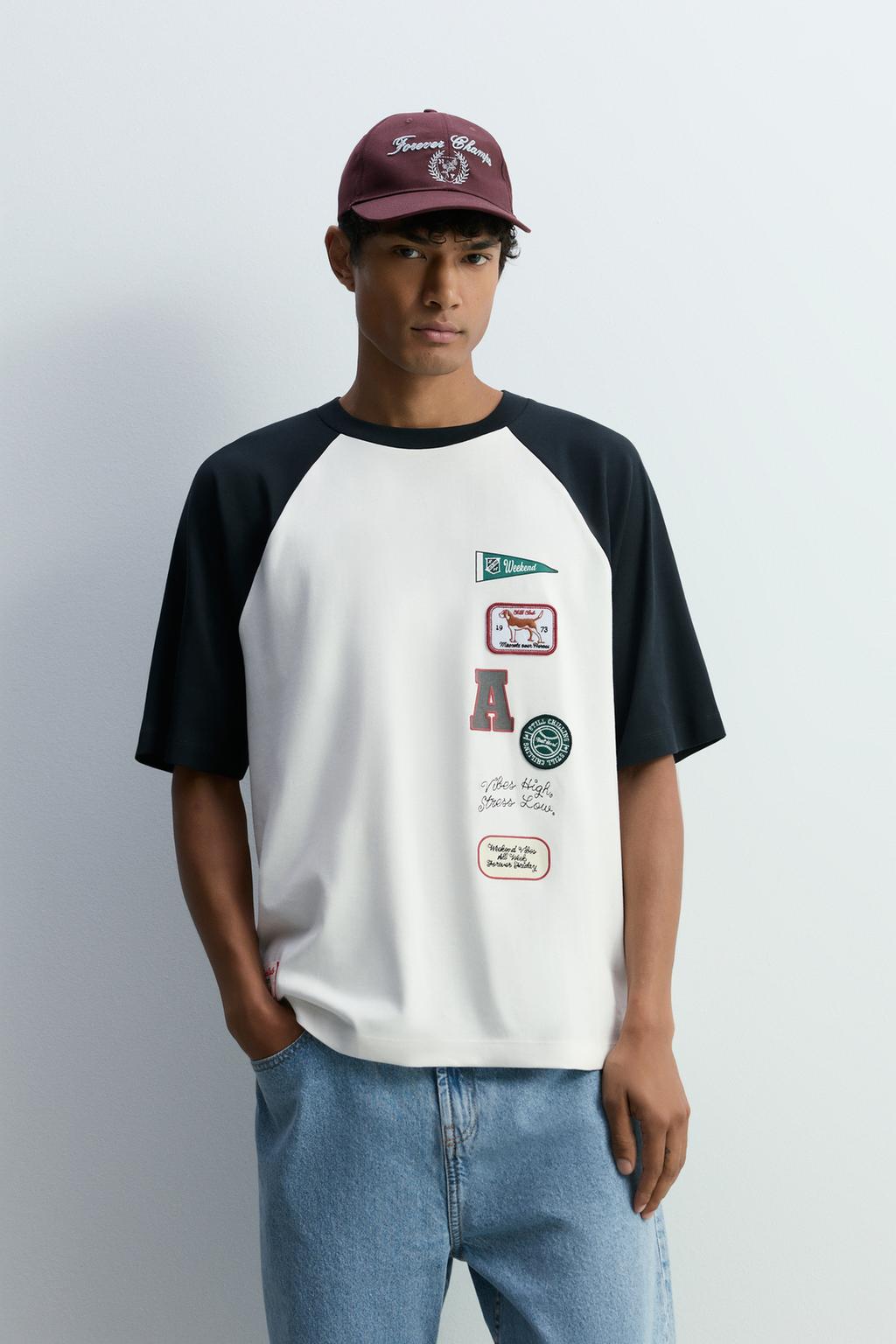 Raglan sleeve T-shirt with patches