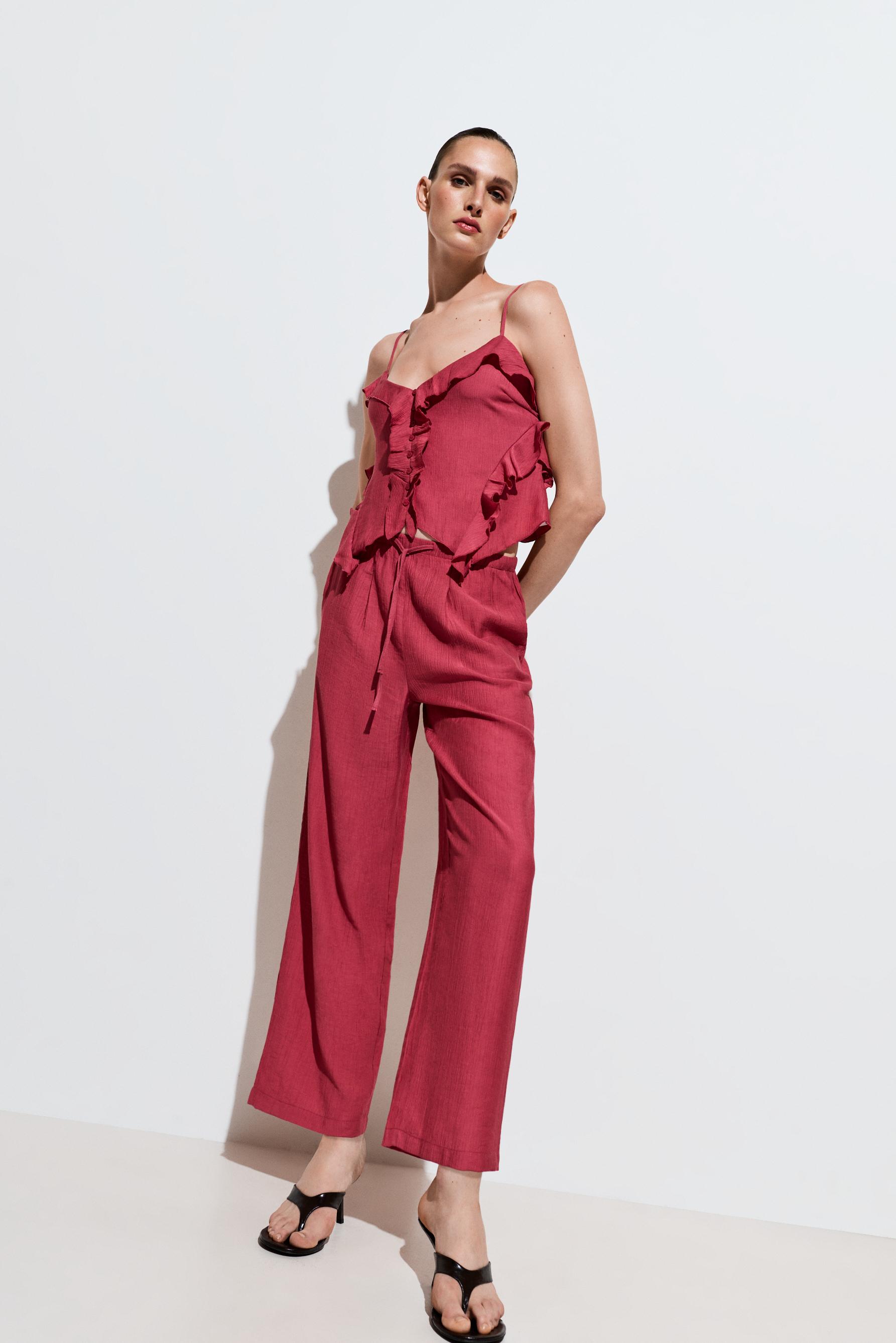 Textured jogging trousers — PALE MAROON