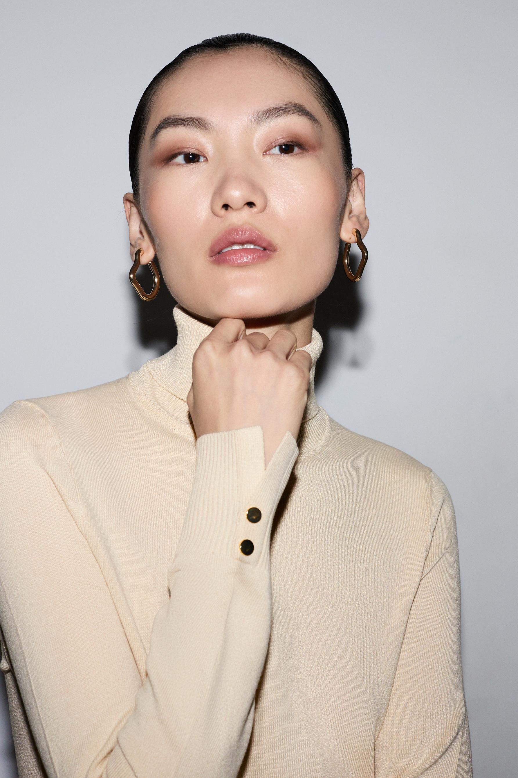 Roll neck sweater — BEIGE MARL