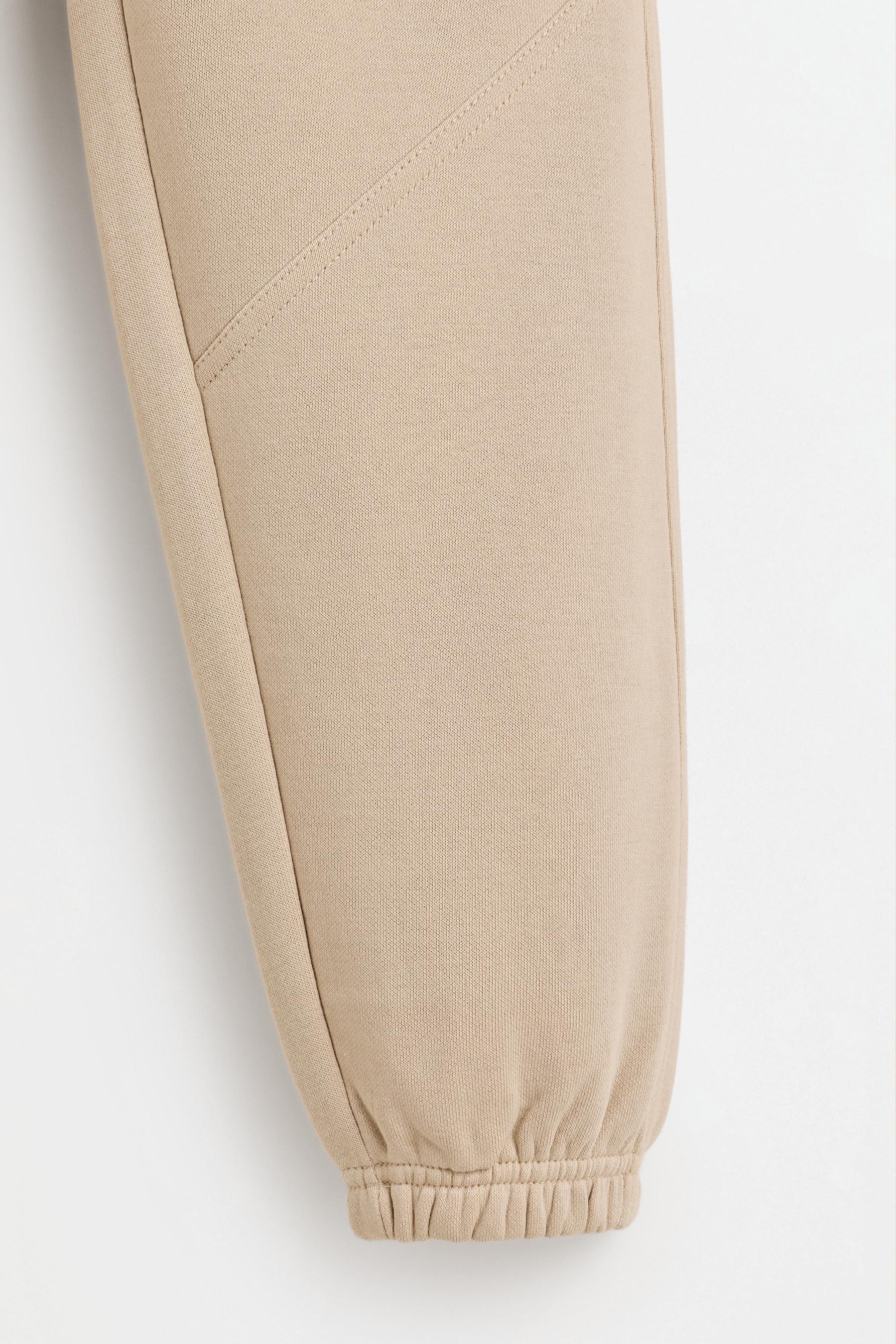 Plush trousers with knee stitching — SAND