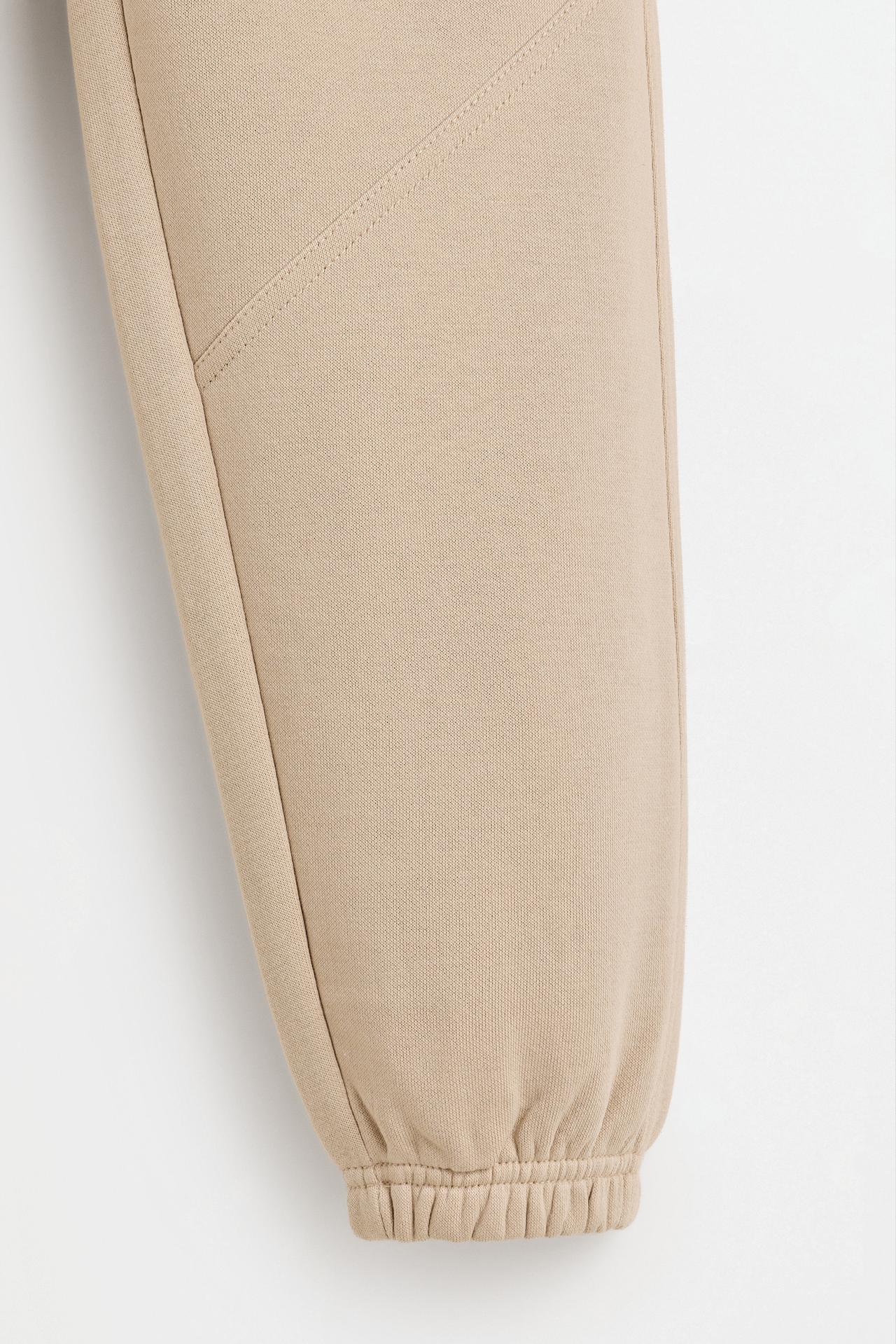 Plush trousers with knee stitching — SAND