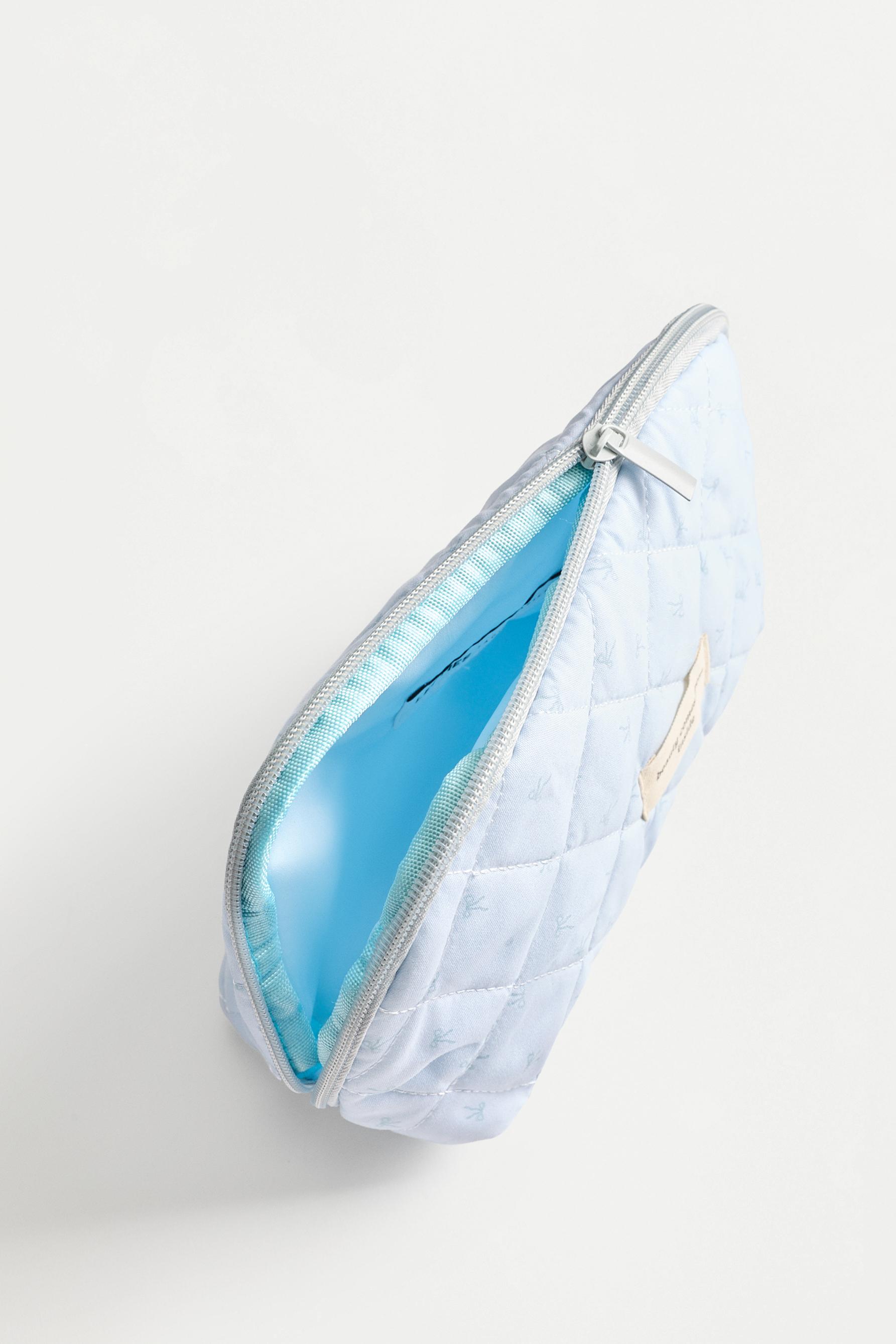 Medium ribbon-print toiletry bag — PASTEL BLUE