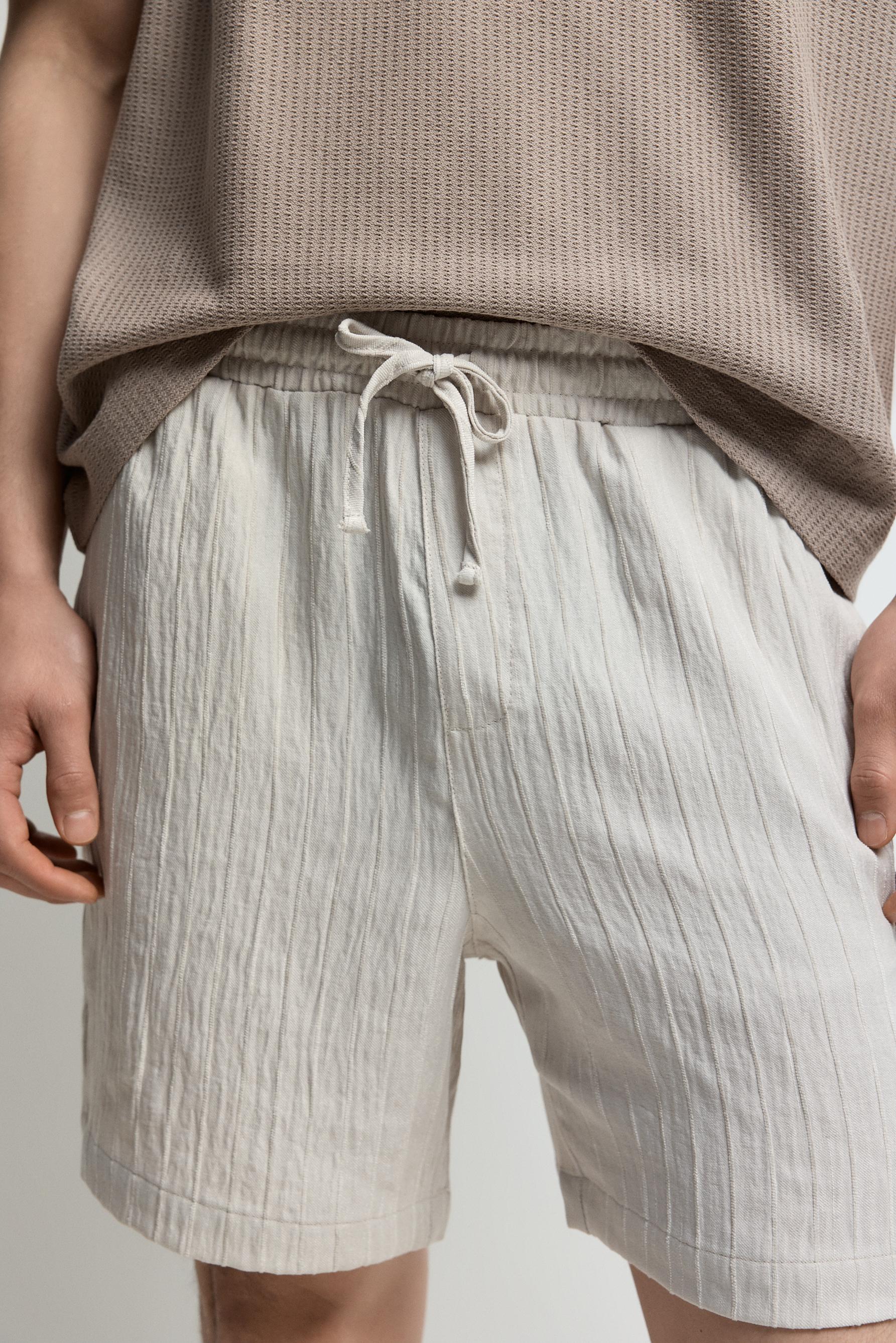 Fluid jogger Bermuda shorts — OFF WHITE