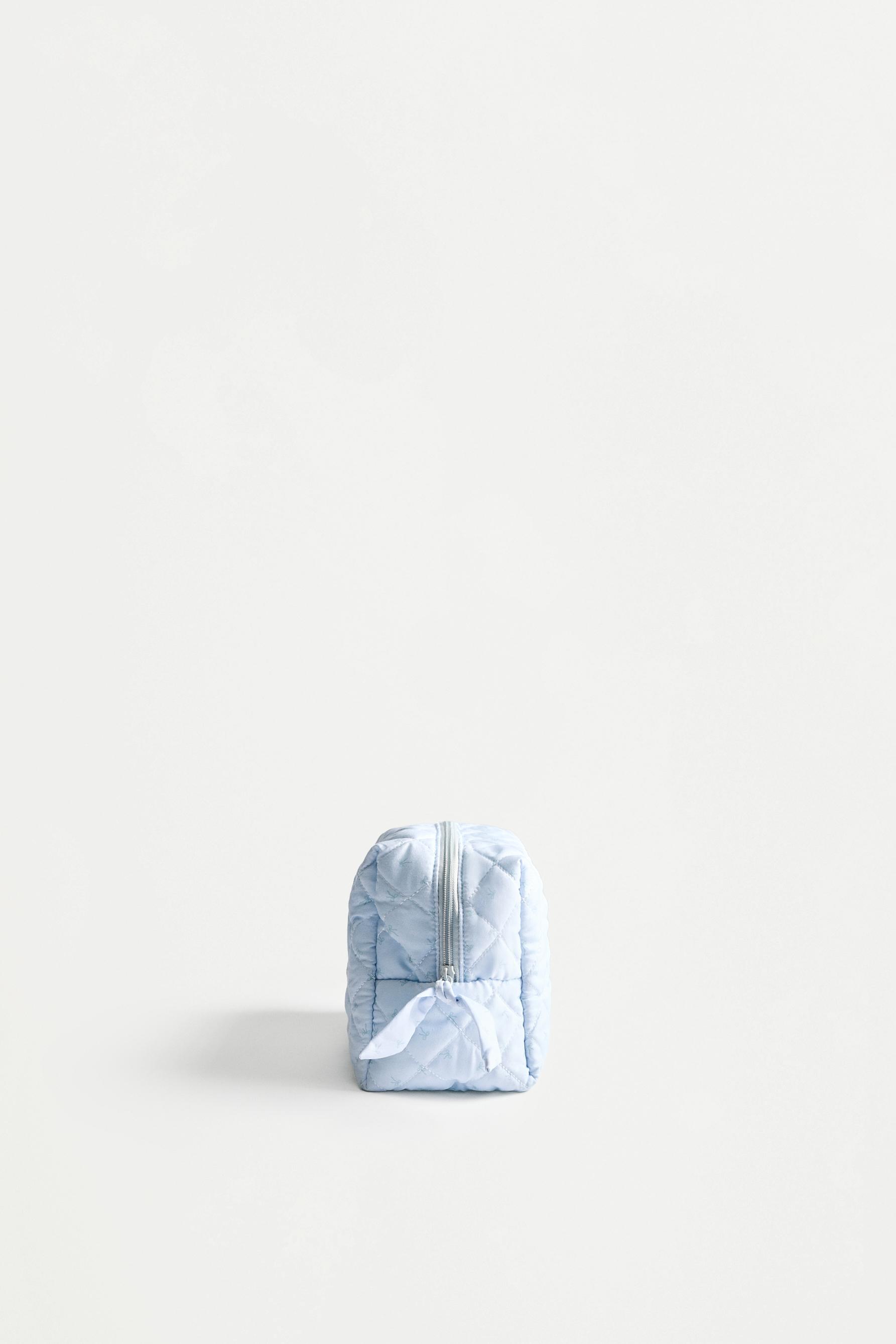 Large bow print toiletry bag — PASTEL BLUE