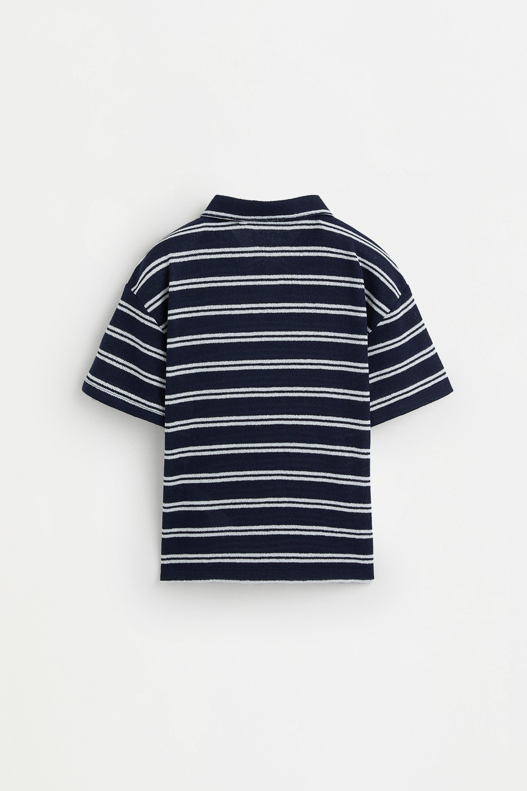 Striped bias cut polo shirt — NAVY