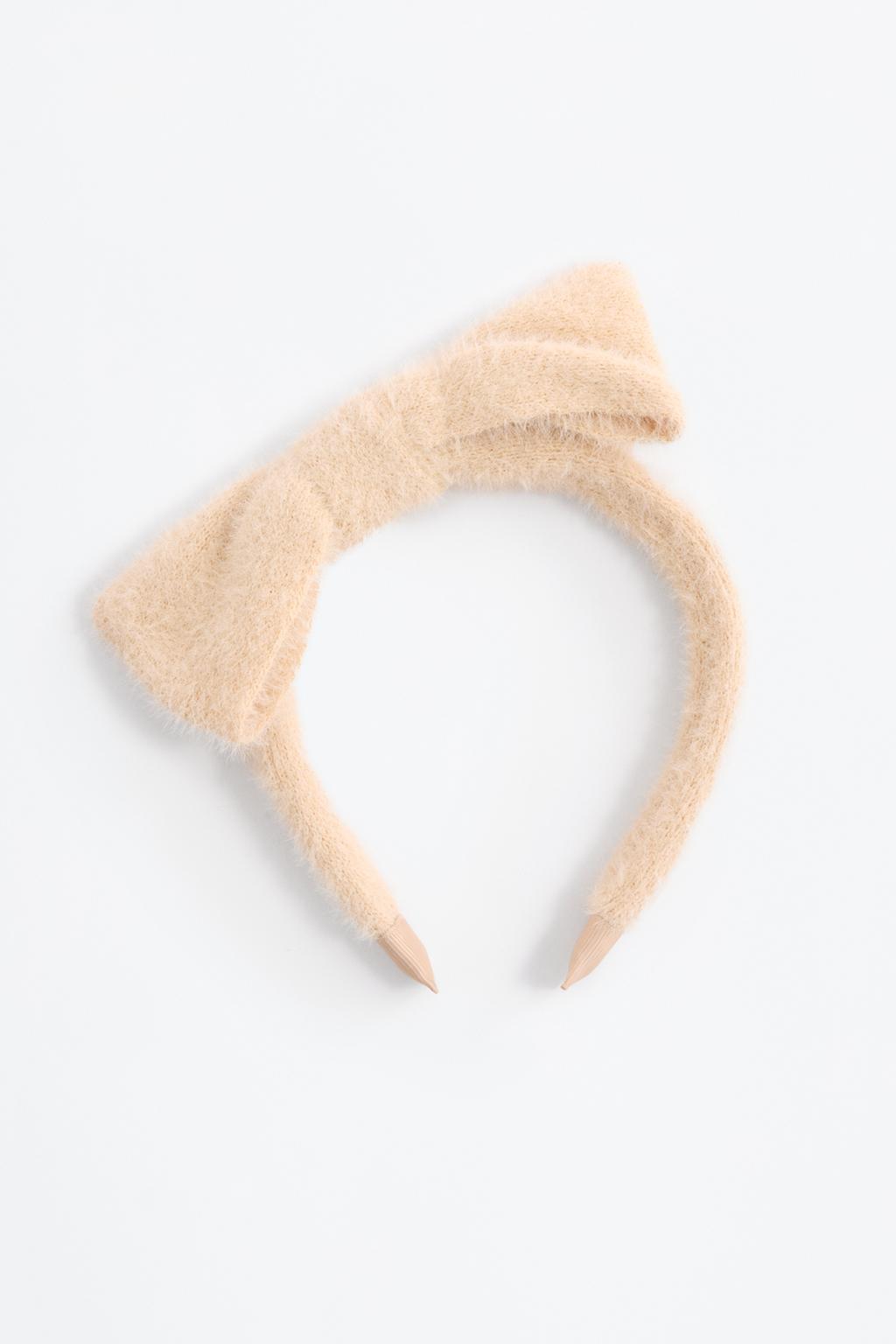 Diadema de pèl amb llaç