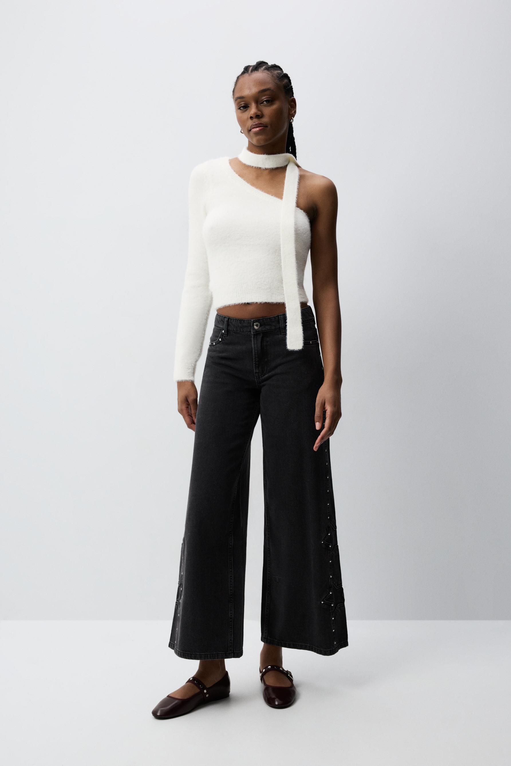 Jeans wide leg tachas