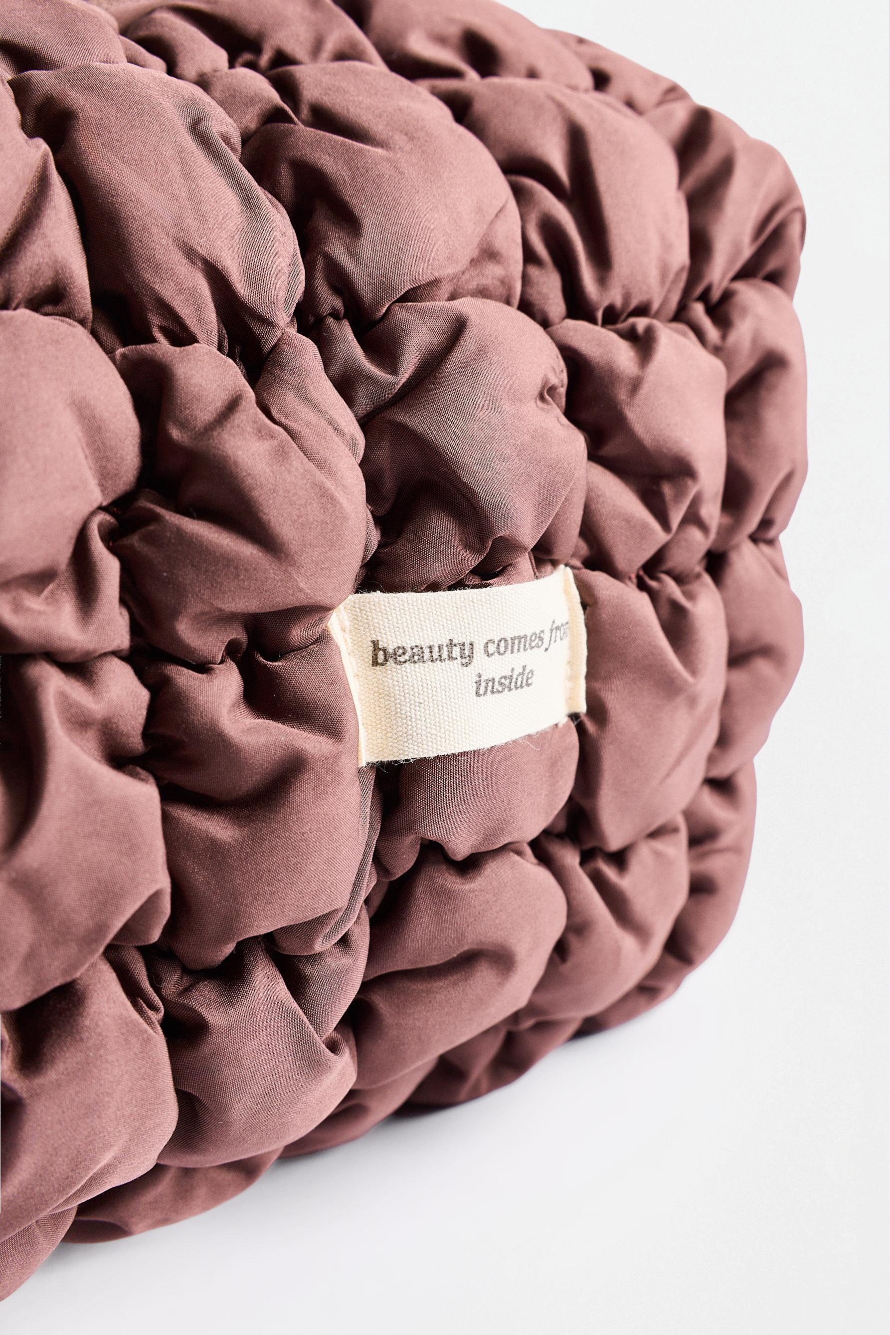 Medium waffle-knit toiletry bag — MINK