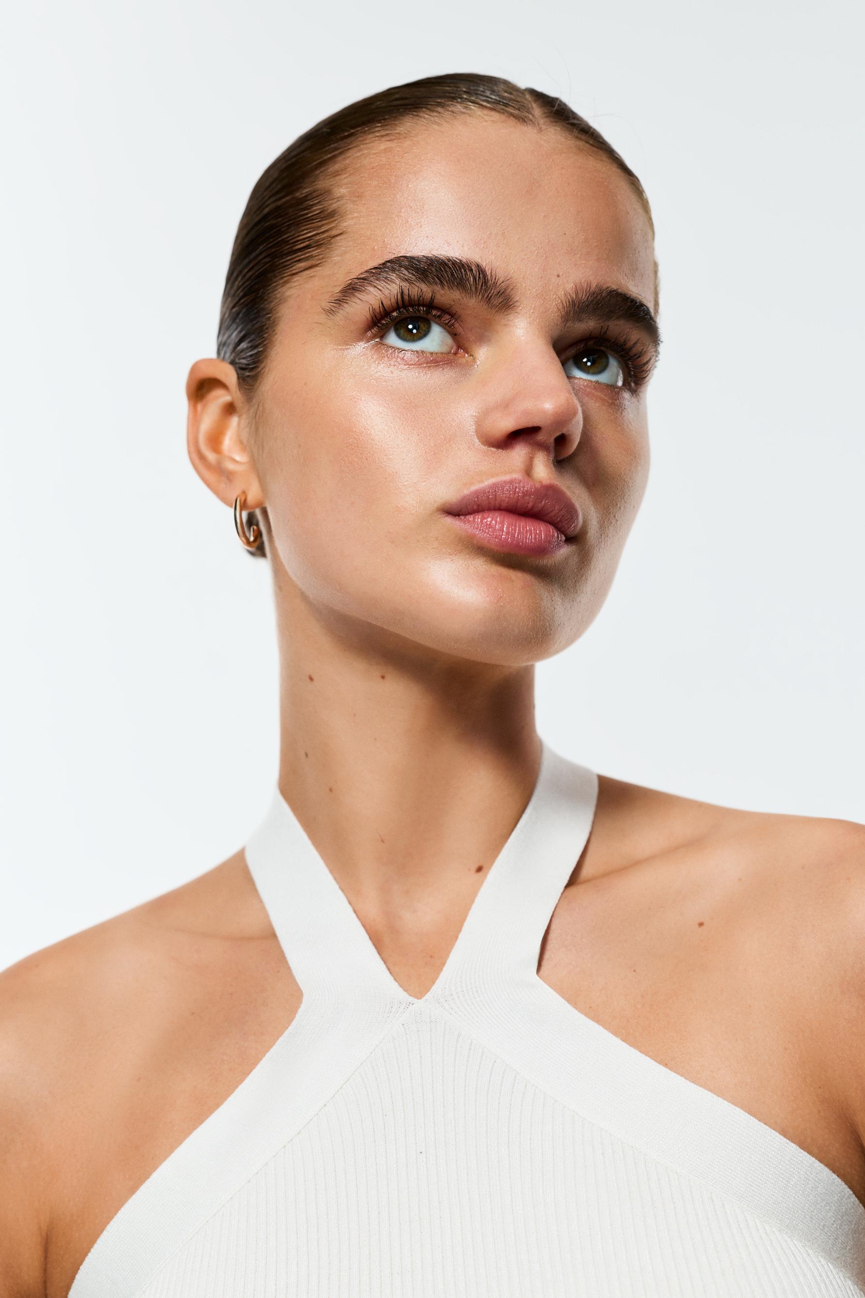 Criss-cross strap knit top — OFF WHITE