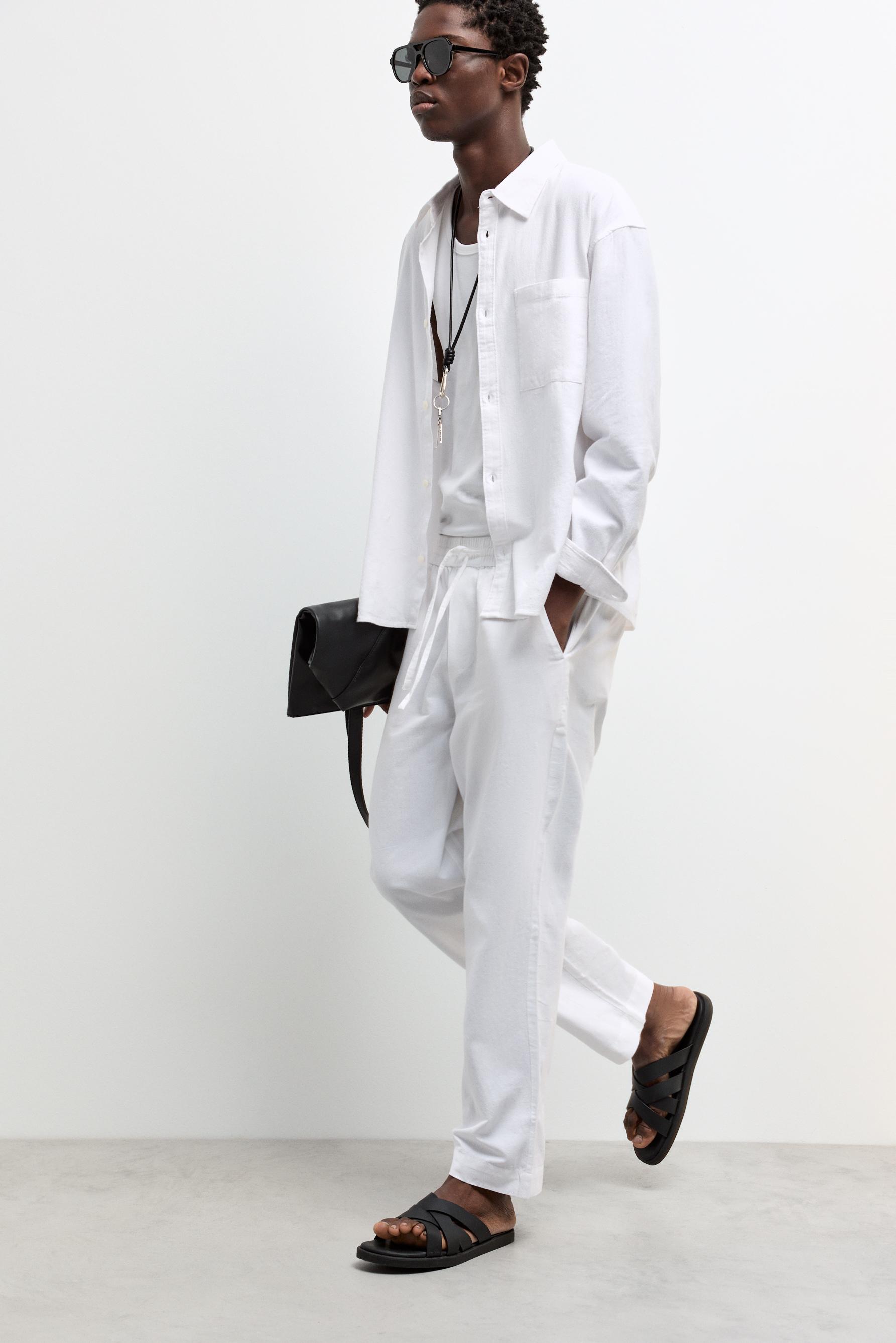 Cross-strap sandals — BLACK