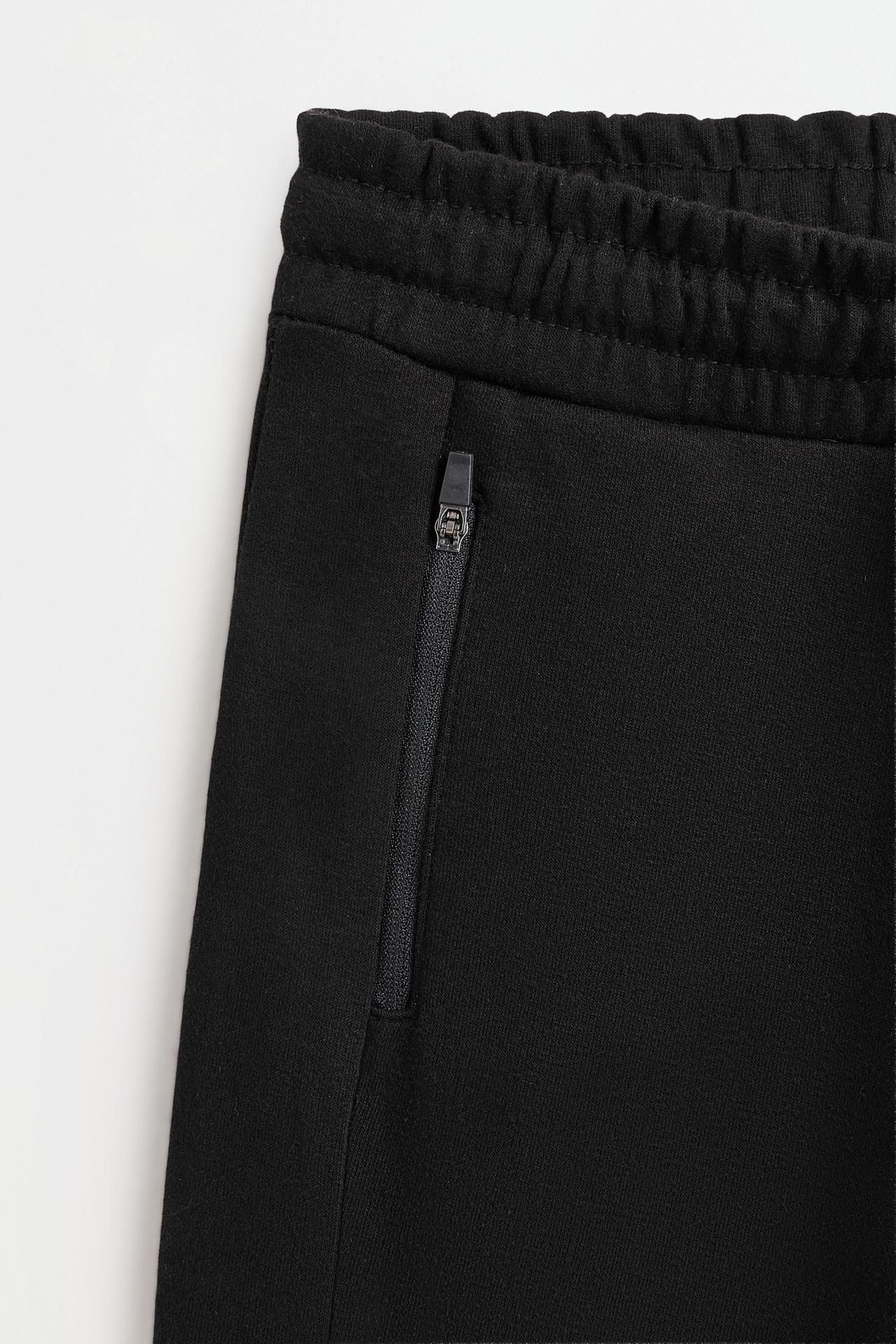 Interlock plush joggers — BLACK