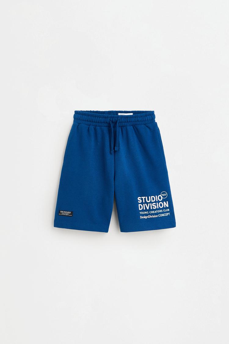 Plush Bermuda shorts with text — DARK BLUE