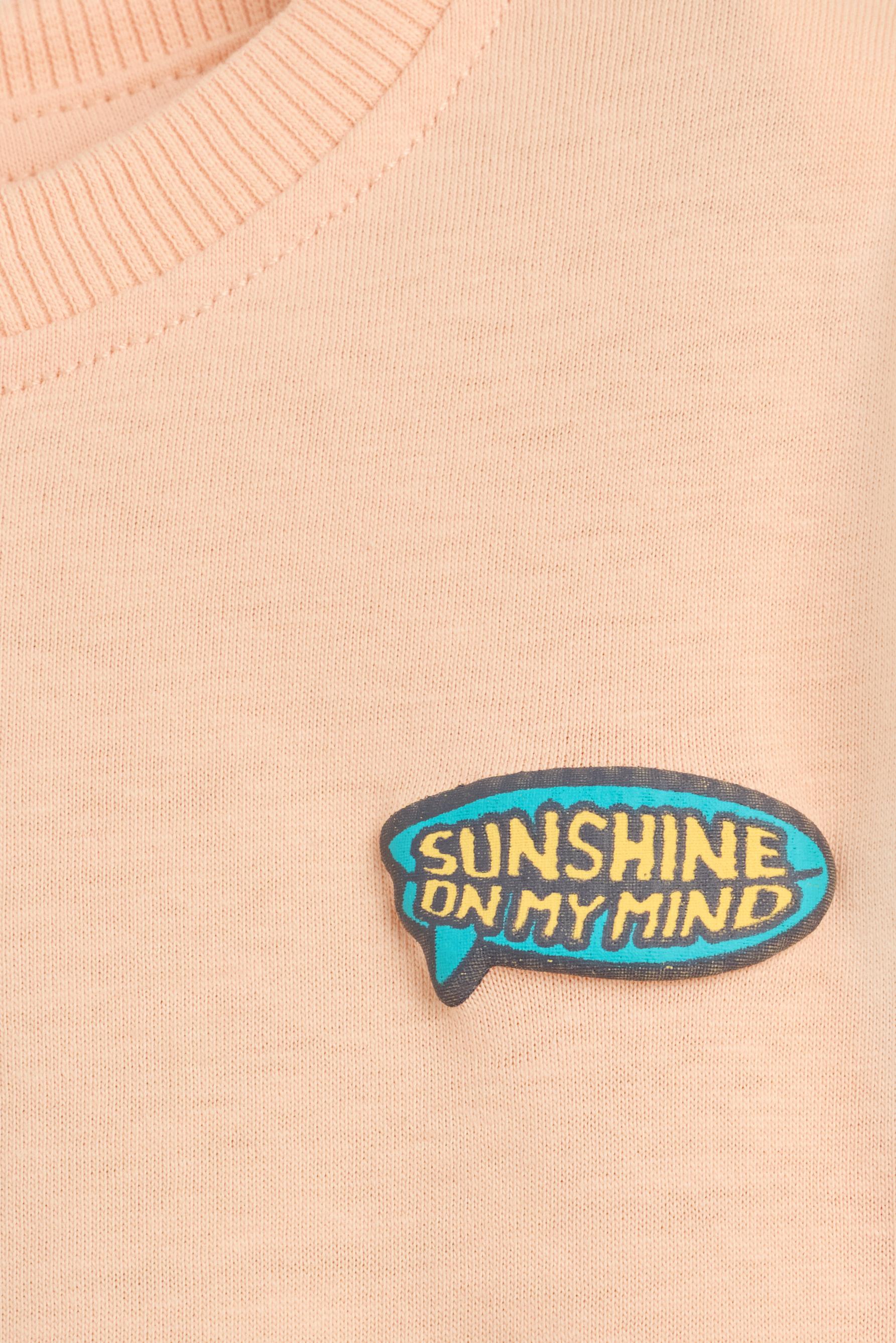 T-shirt with a maxi print on the back — ORANGE