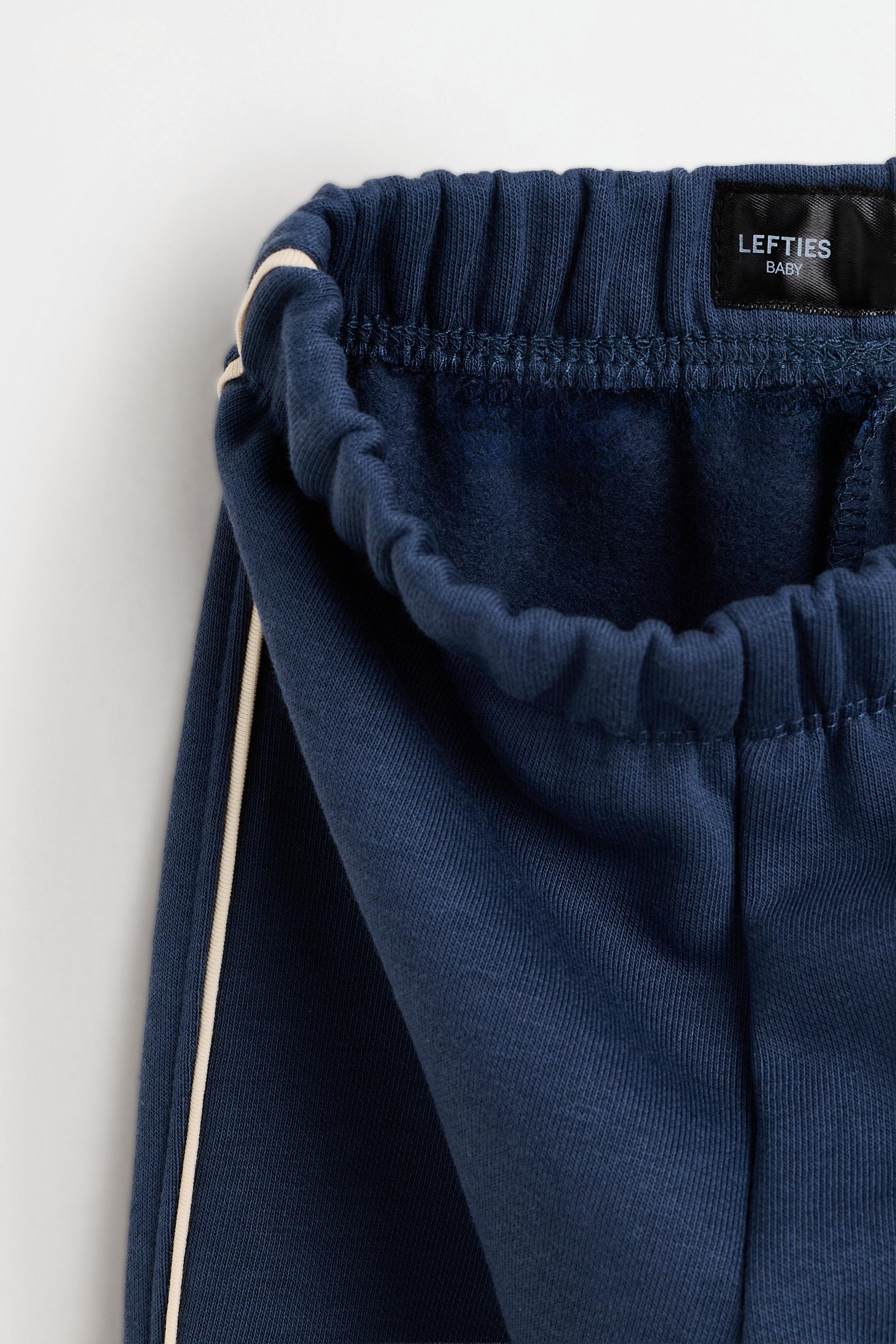 Polo sweatshirt and bow trousers set — ECRU