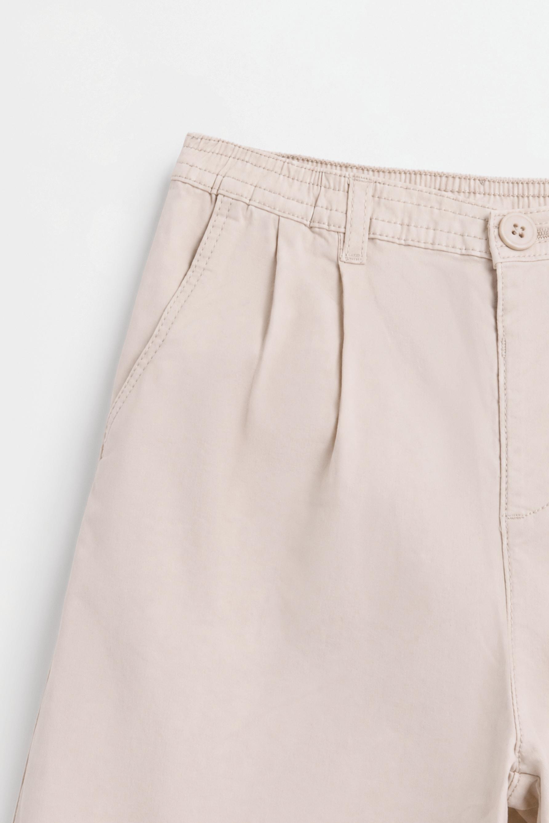 Balloon fit trousers with pleats — SAND