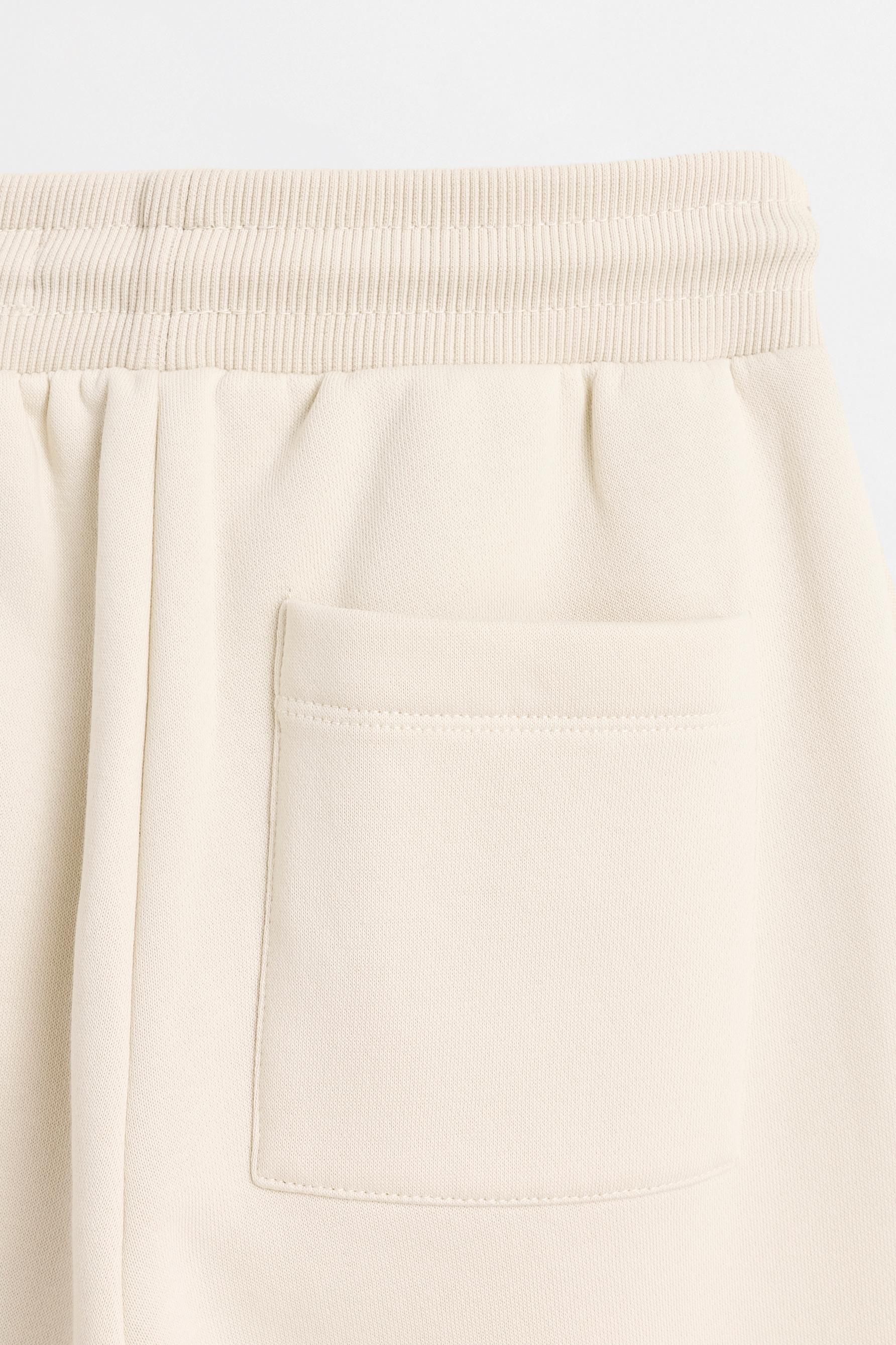 Printed tracksuit trousers — GREY