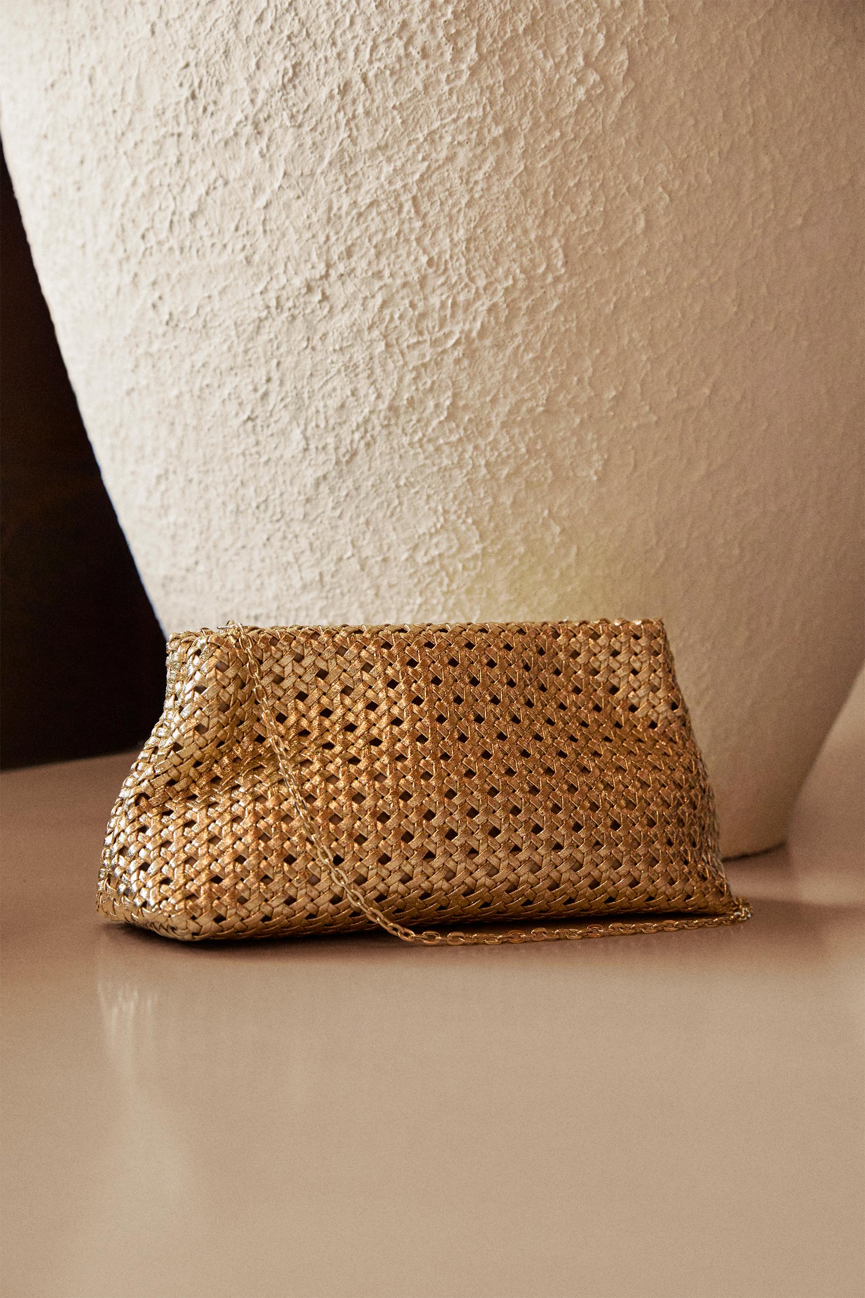 Woven clutch bag — GOLD