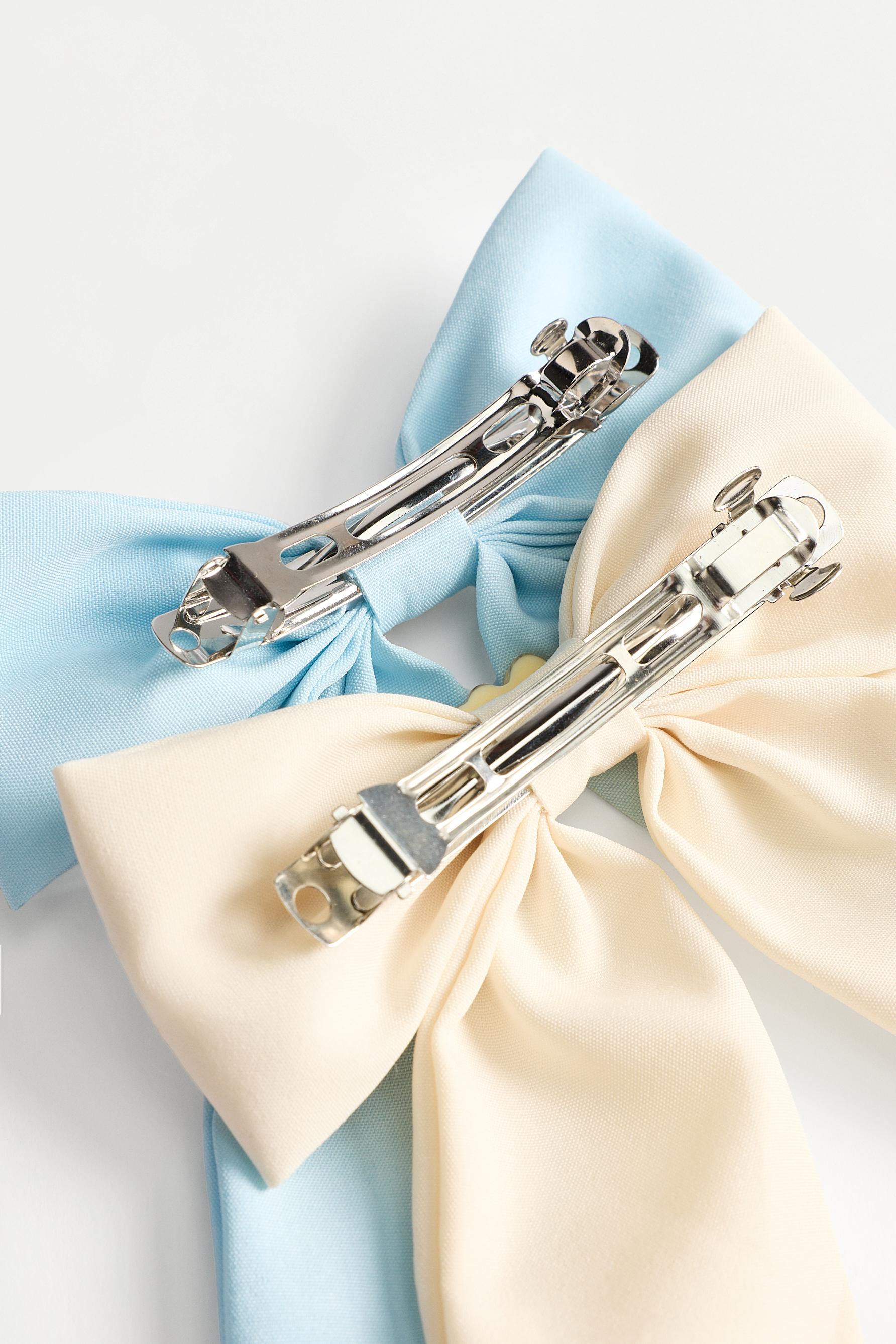 Hello Kitty ©SANRIO and Cinnamoroll bows (2-pack) — BEIGE