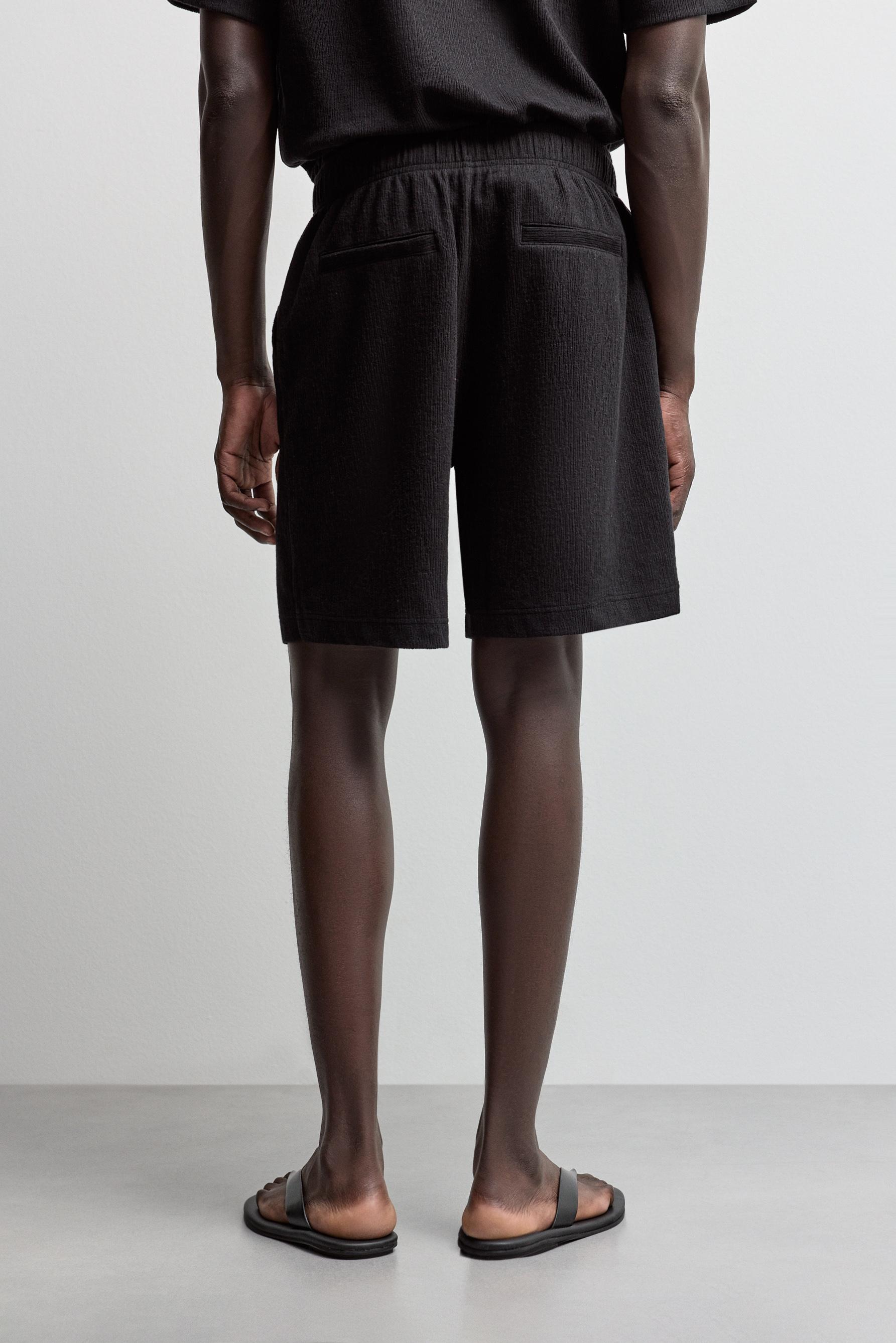 Rustic textured Bermuda shorts — BLACK