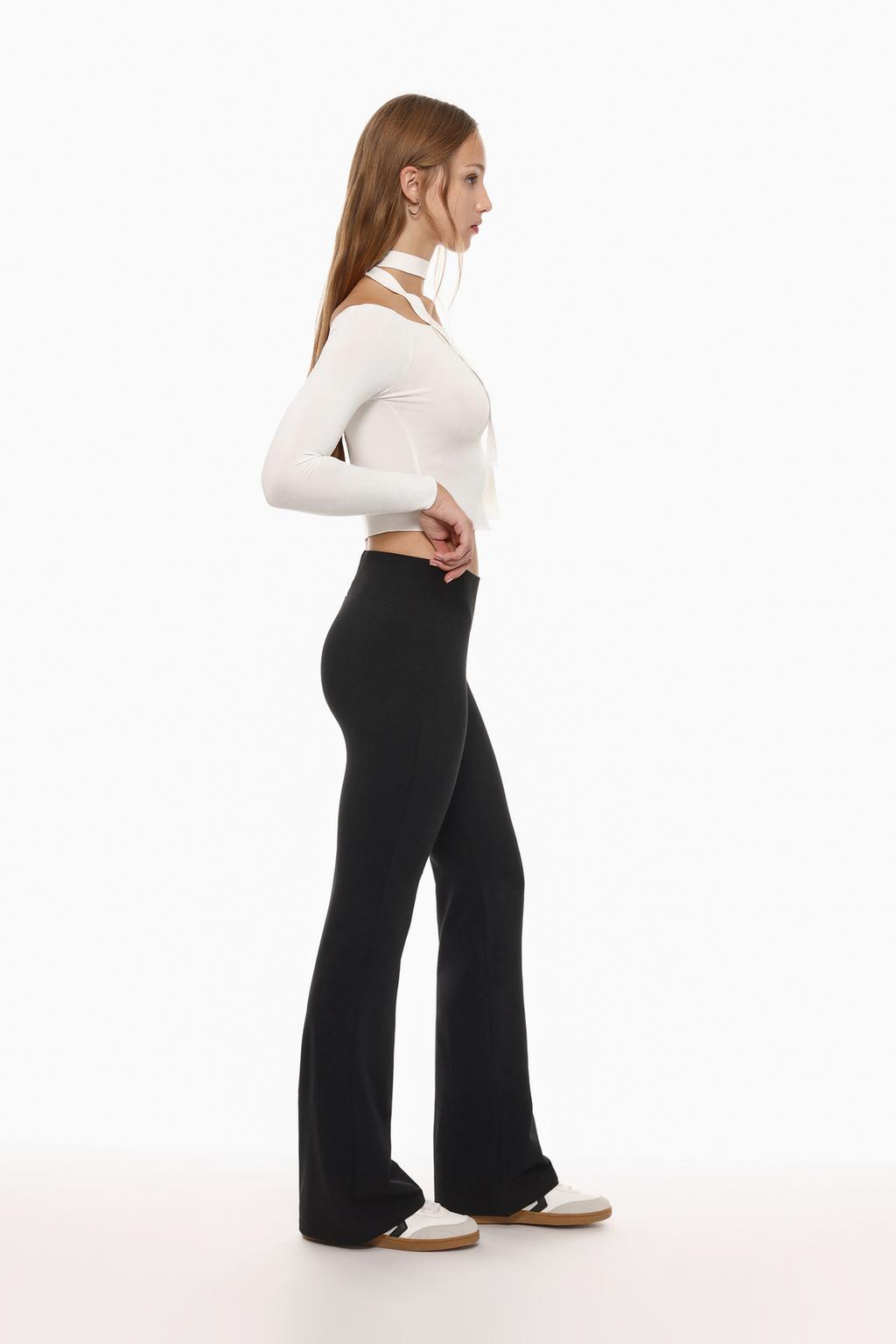 Flared leggings with ribbed waist