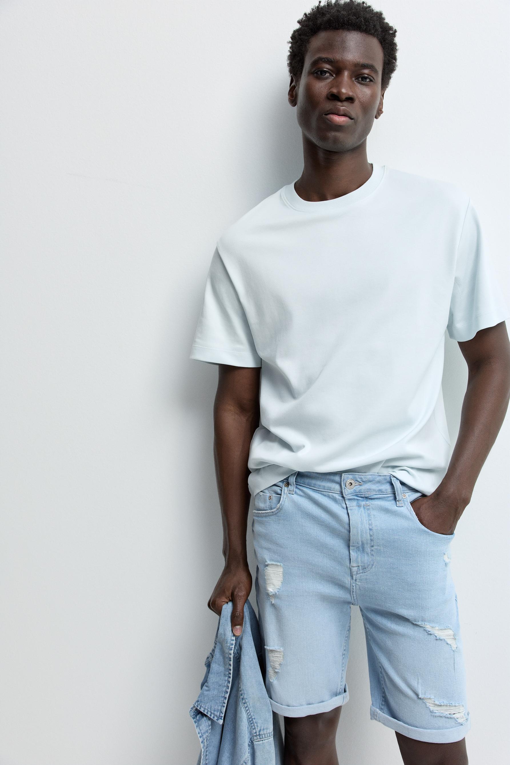 Distressed skinny denim Bermuda shorts — PALE BLUE