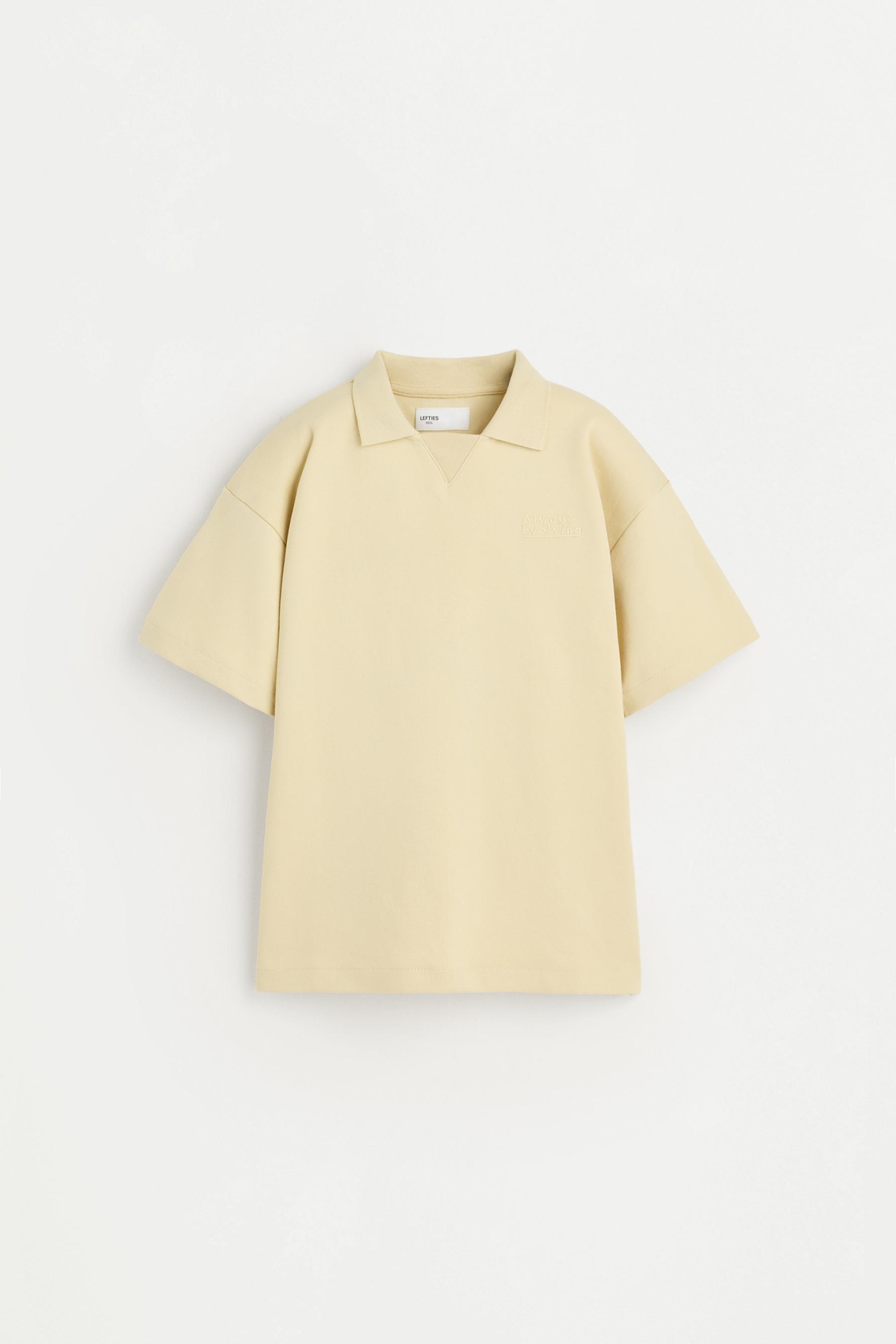 Interlock polo shirt with text — VANILLA