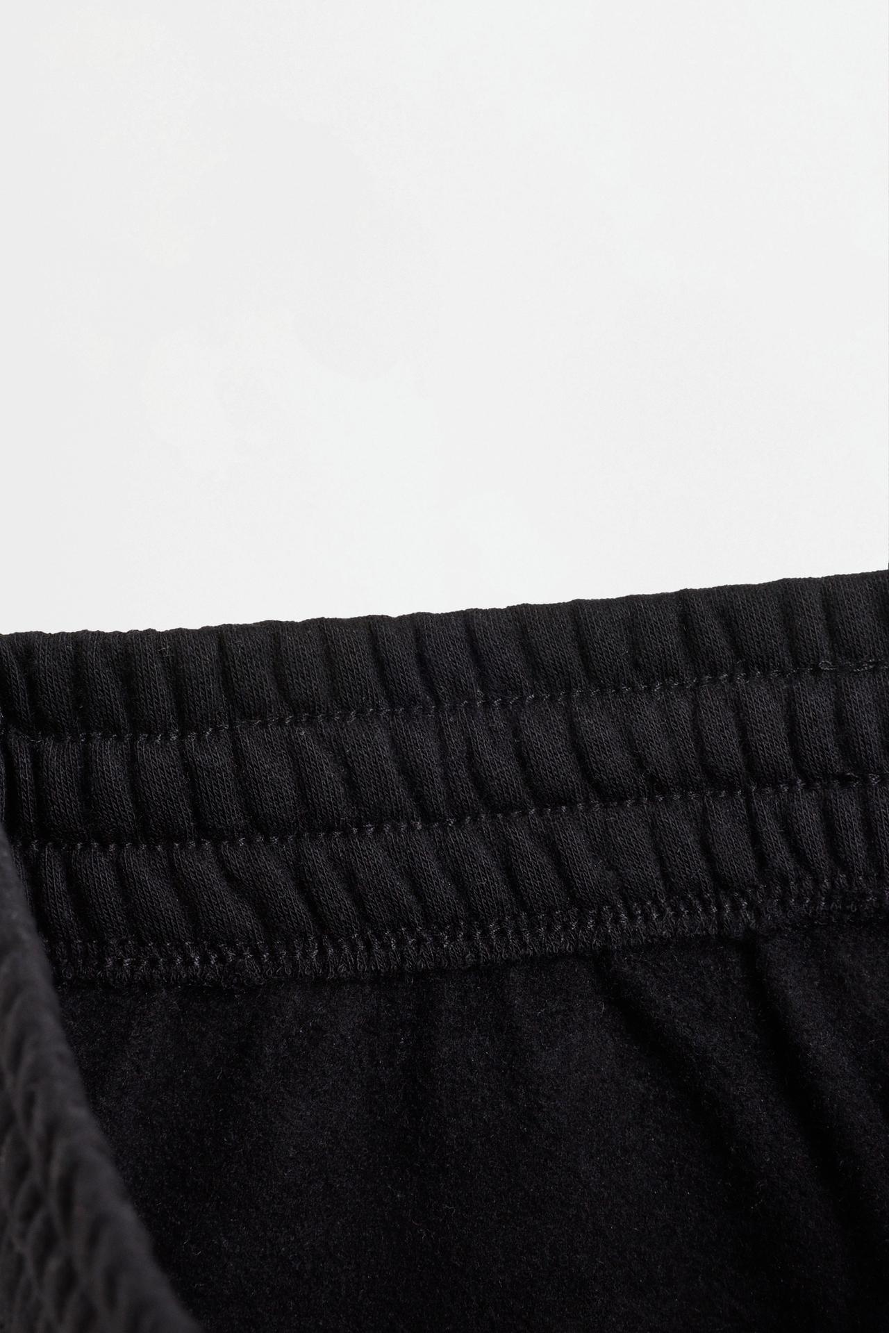 Solid plush trousers — BLACK