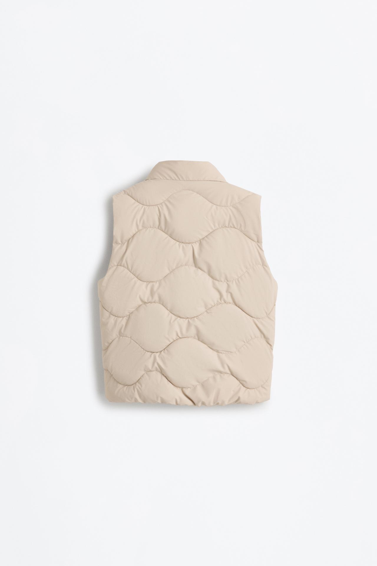 Rubberised wave vest — ECRU