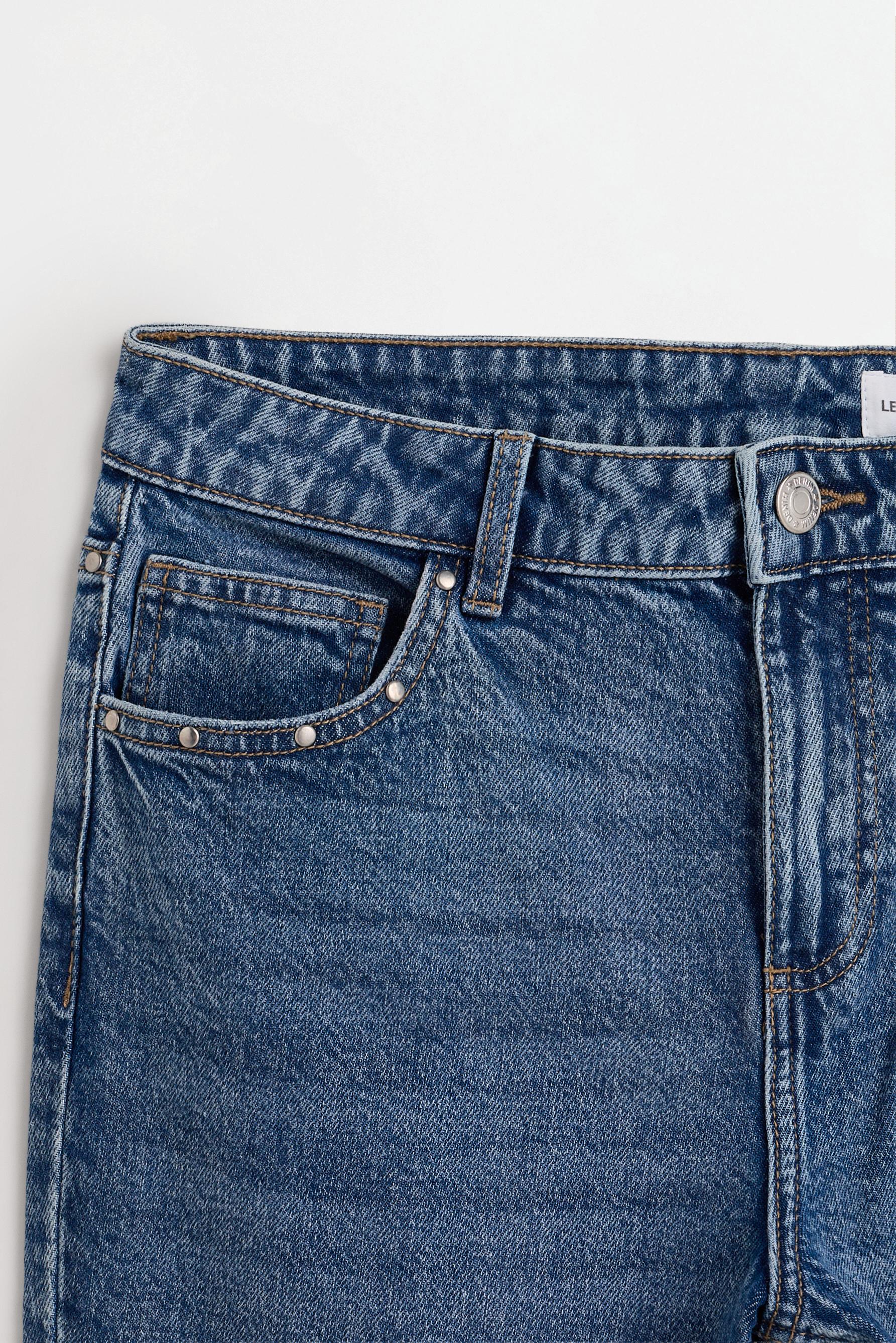 Rhinestone wing bell bottom jeans — INDIGO