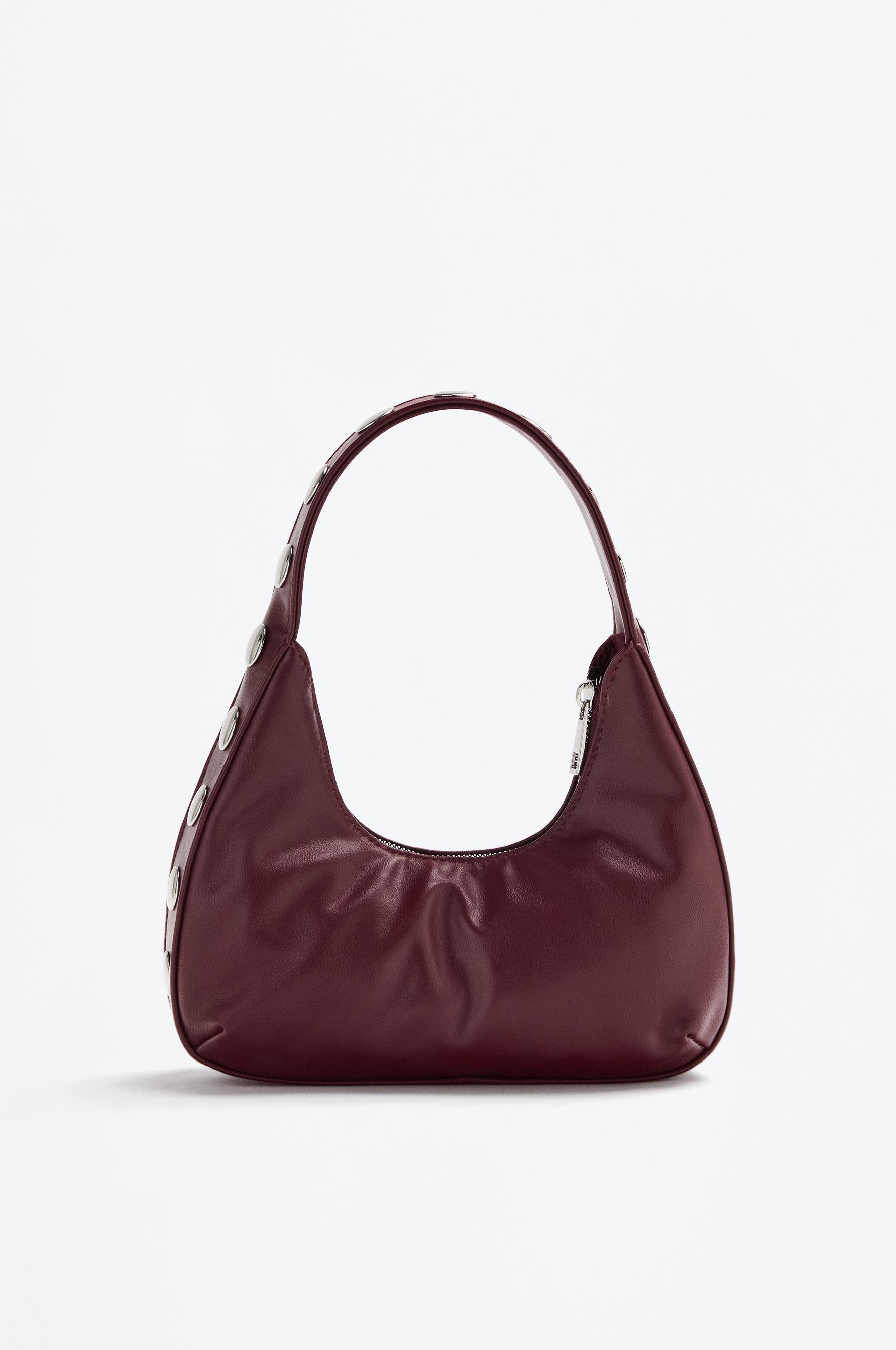 Bolso de hombro tachas