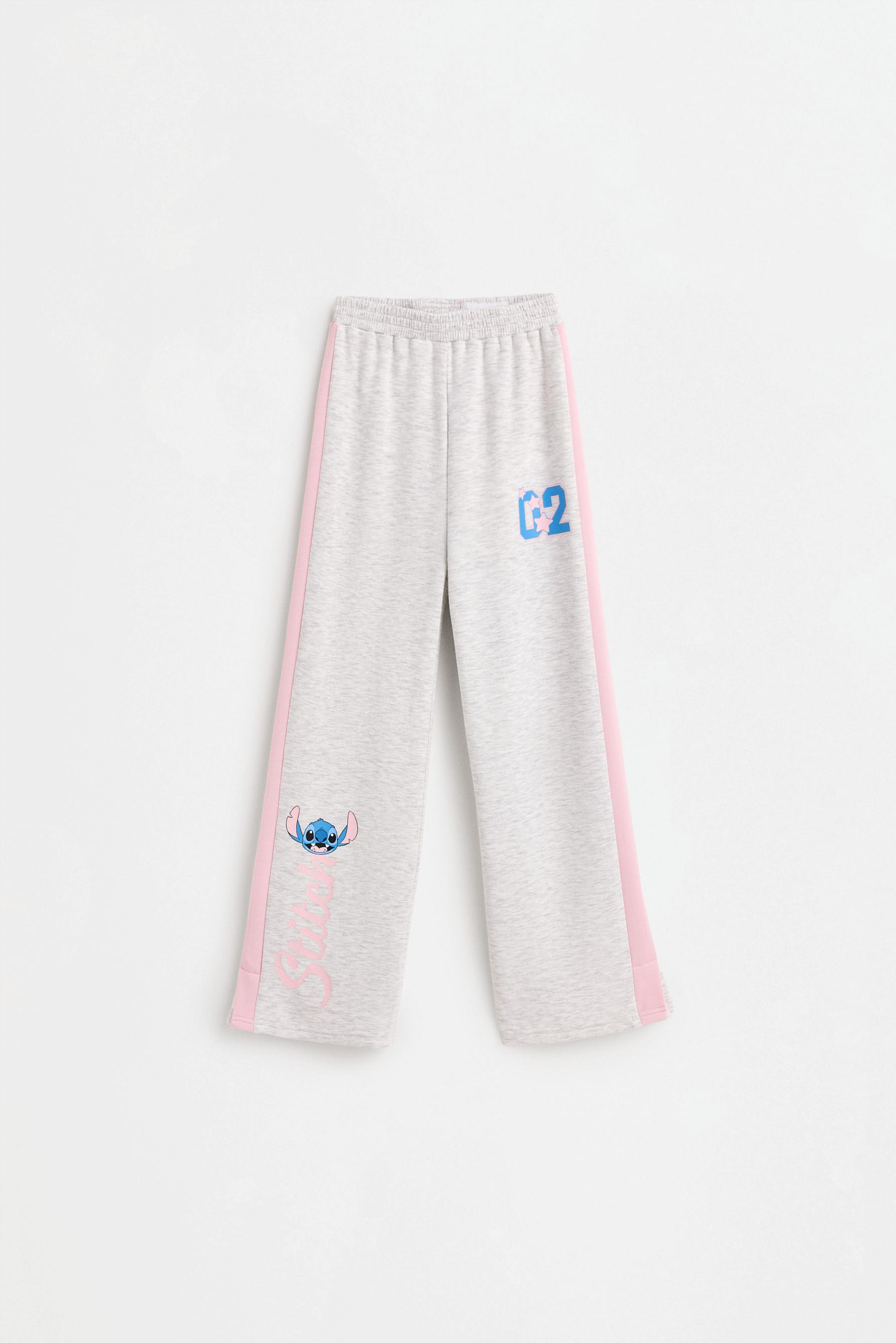 Pantalón felpa Stitch ©Disney wide leg con bandas laterales