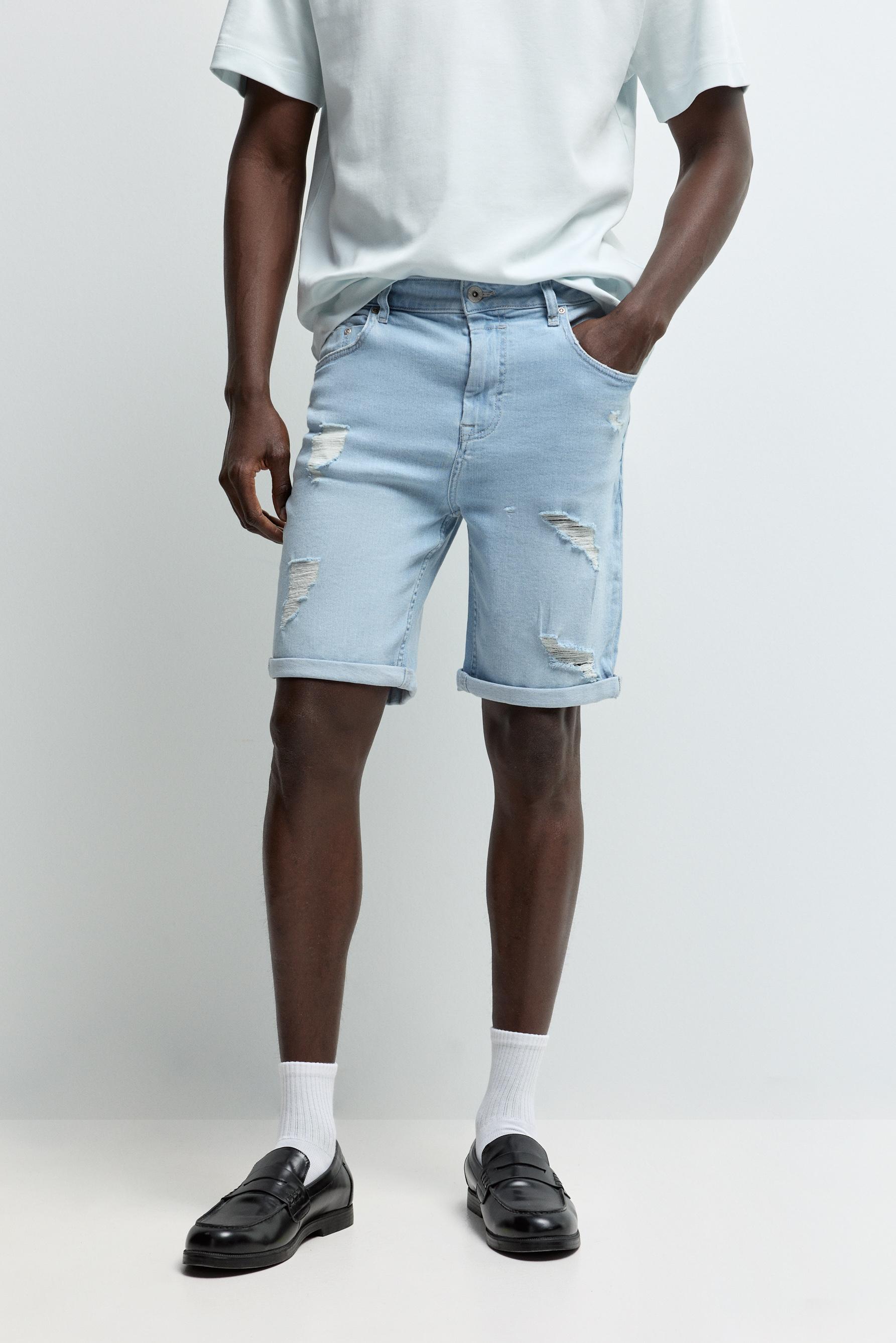 Distressed skinny denim Bermuda shorts — PALE BLUE