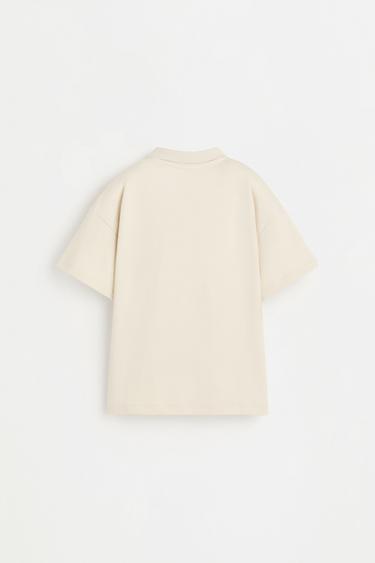 Interlock polo shirt with text — ECRU 2