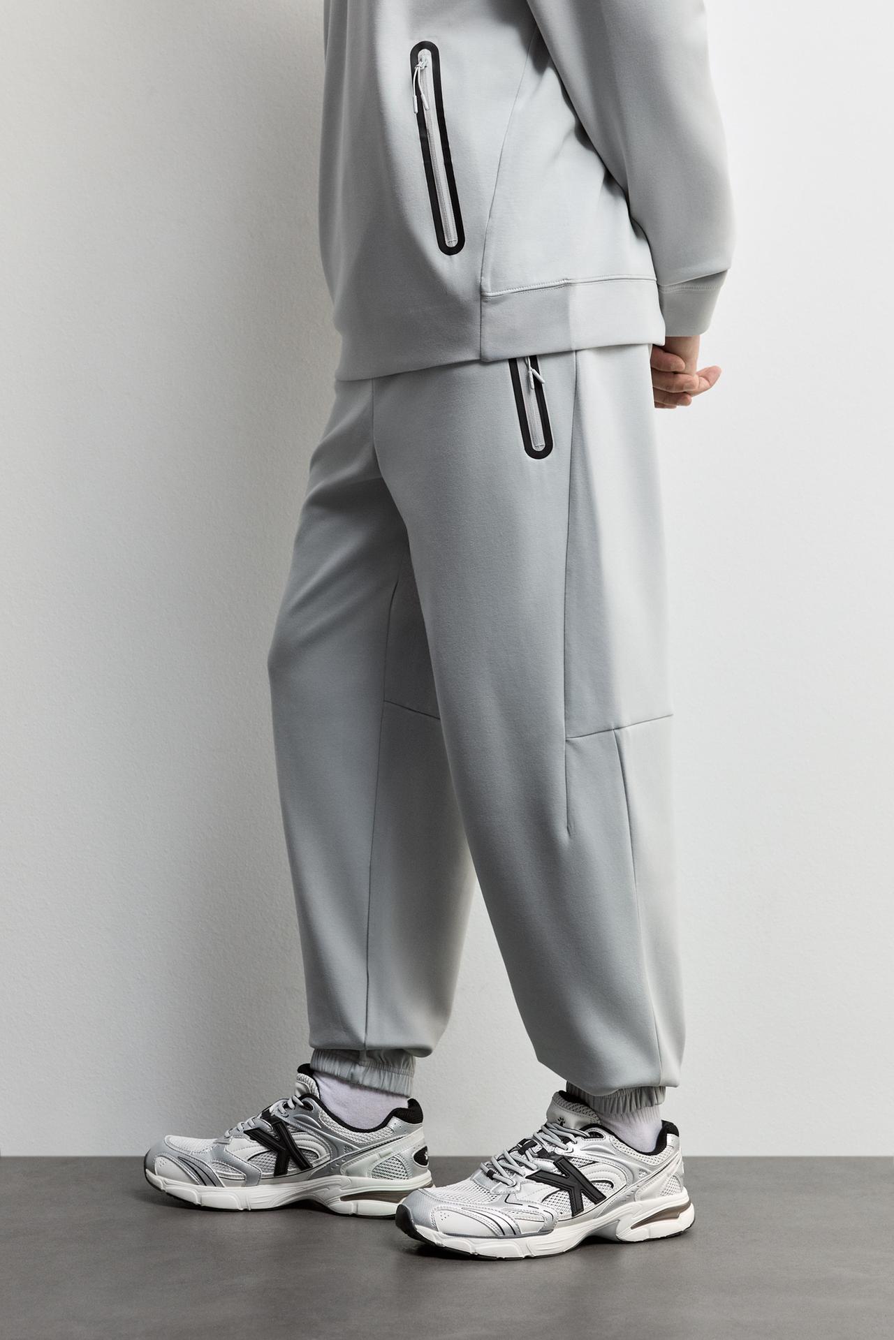 Wide-leg interlock trousers — GREY MARL