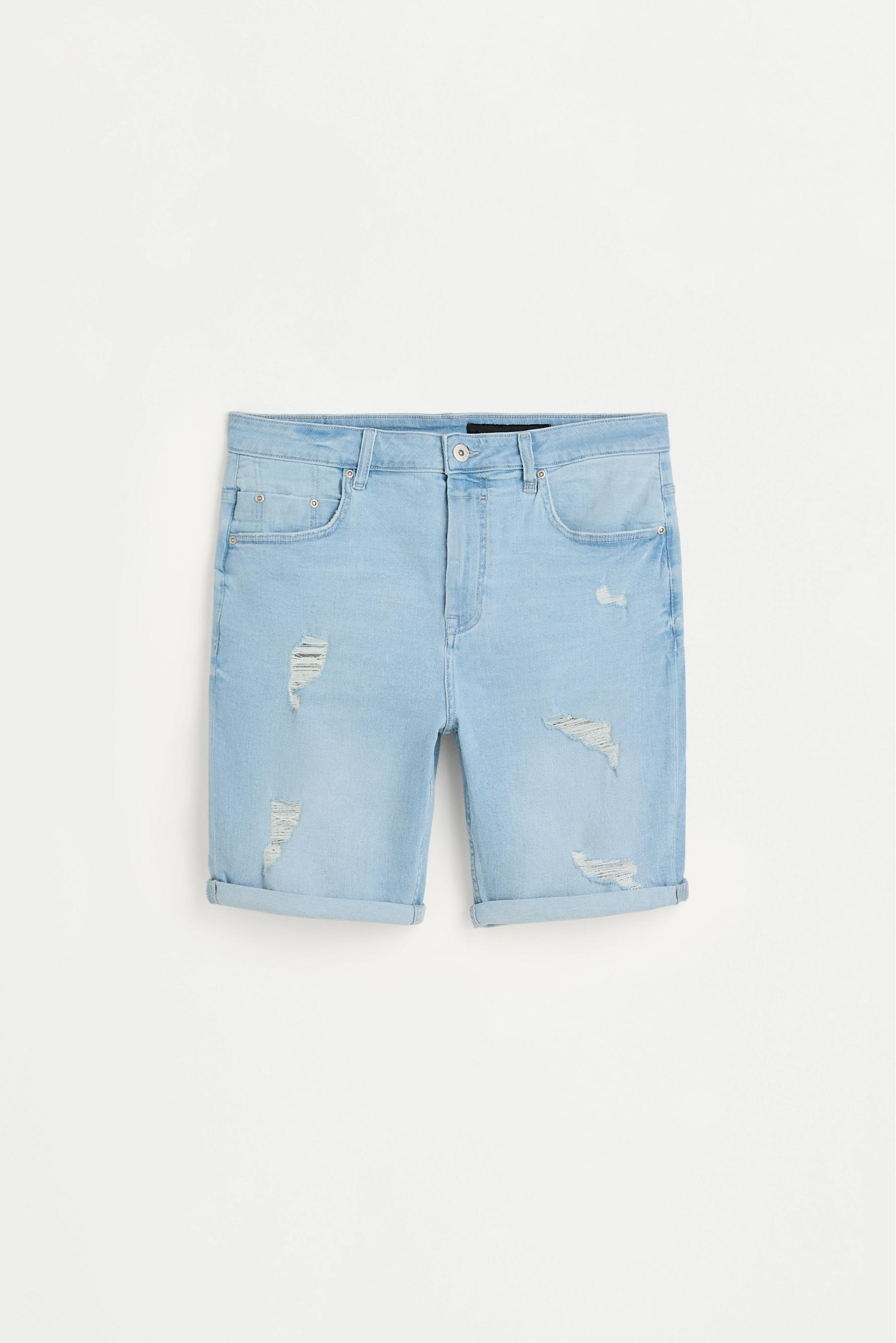 Distressed skinny denim Bermuda shorts — PALE BLUE