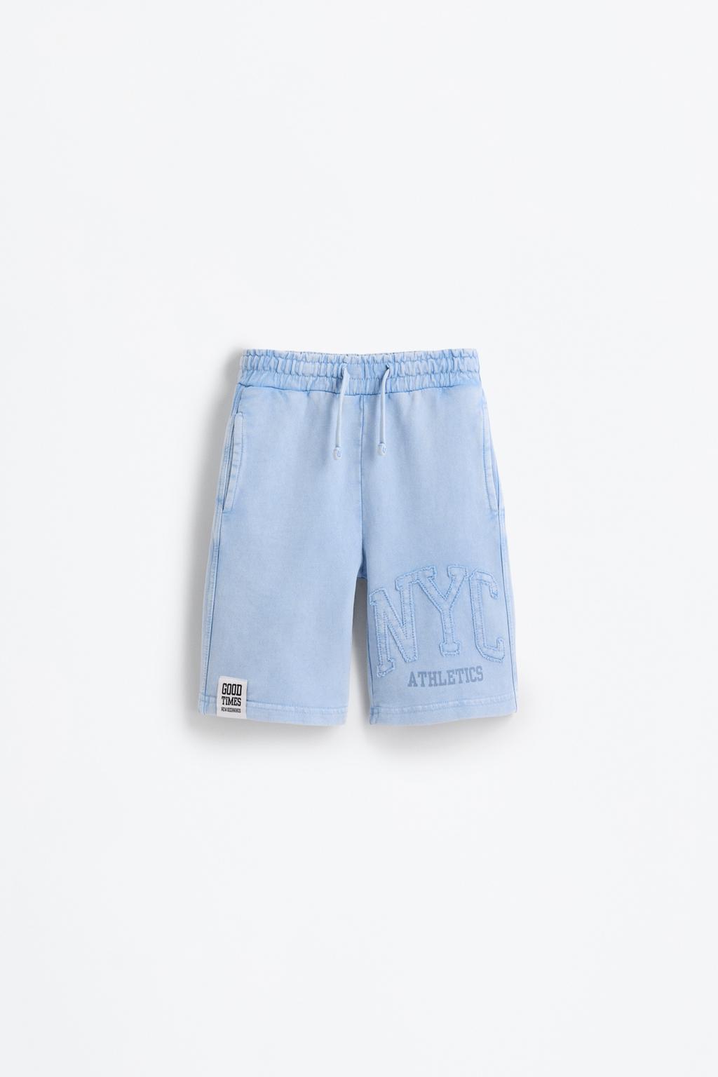 Calções bermuda jogger lavados remendos