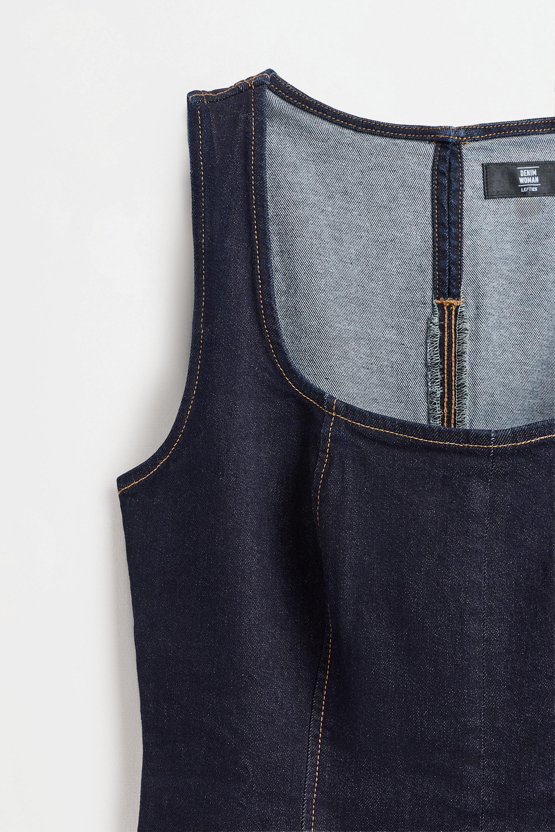 Denim peplum top with contrast stitching — NAVY
