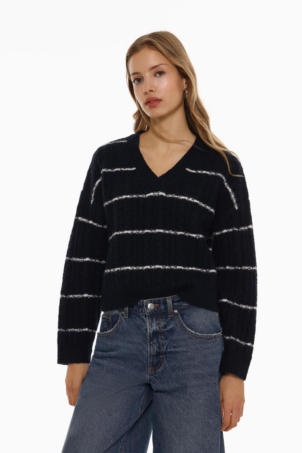 Cable-knit V-neck sweater