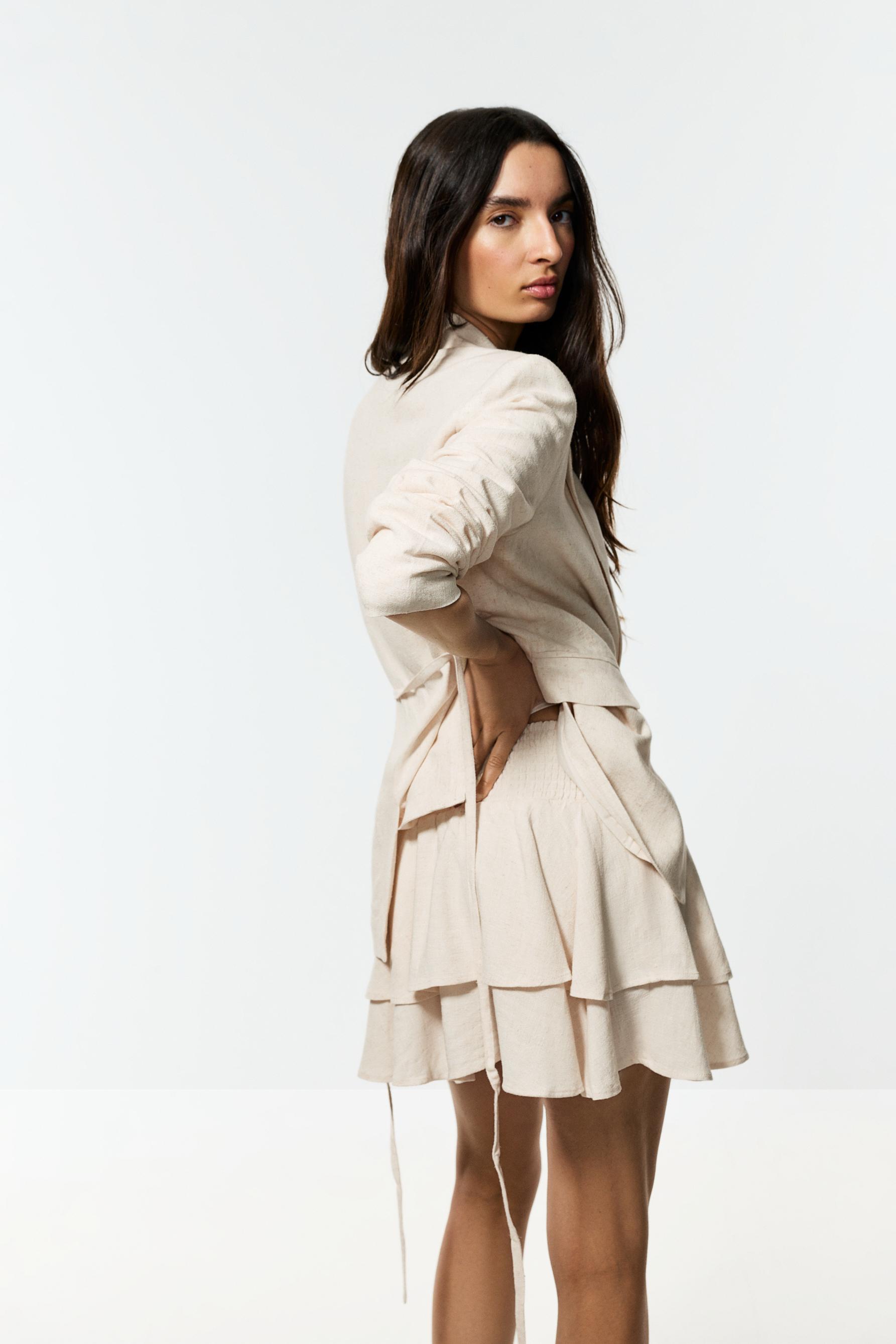 Short rustic skirt with ruffles — BEIGE