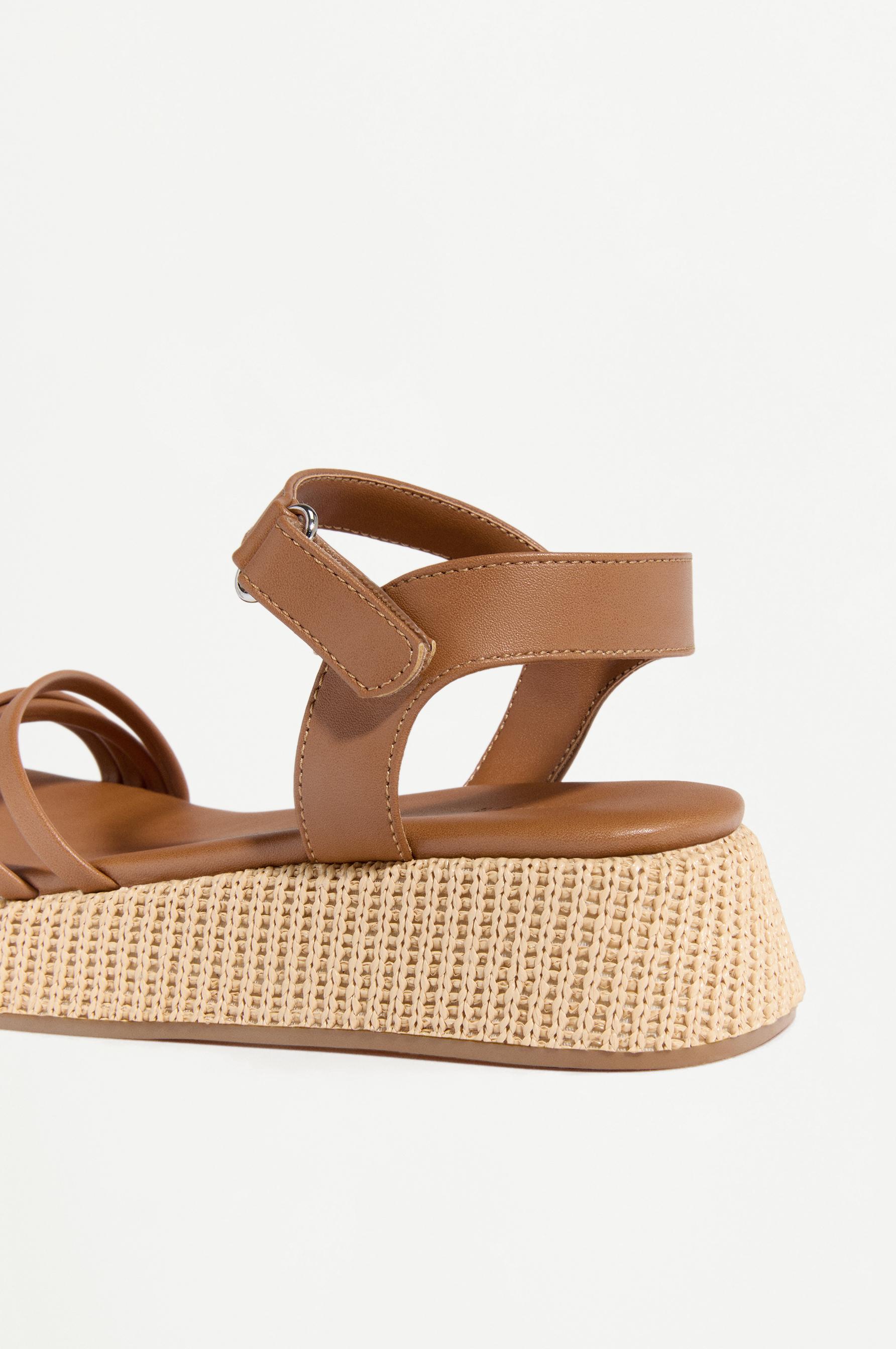 STRAPPY PLATFORM SANDAL — LEATHER