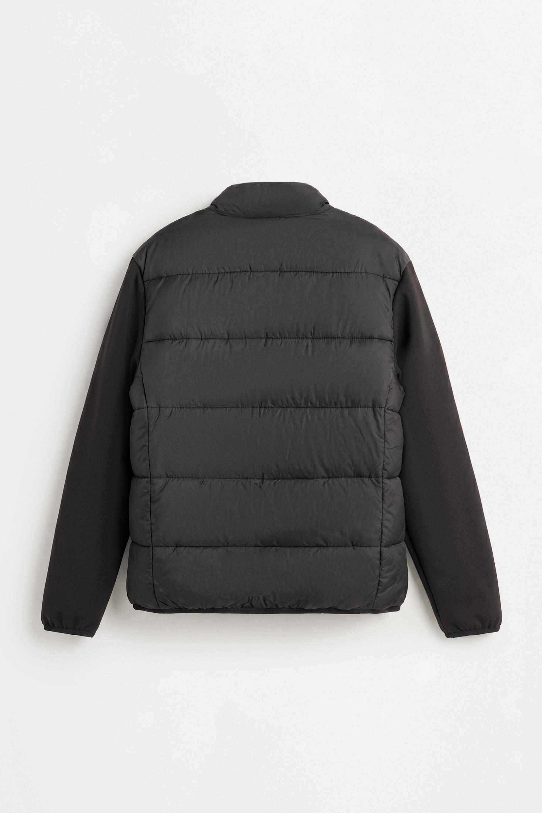Quilted jacket with interlock sleeves — BLACK