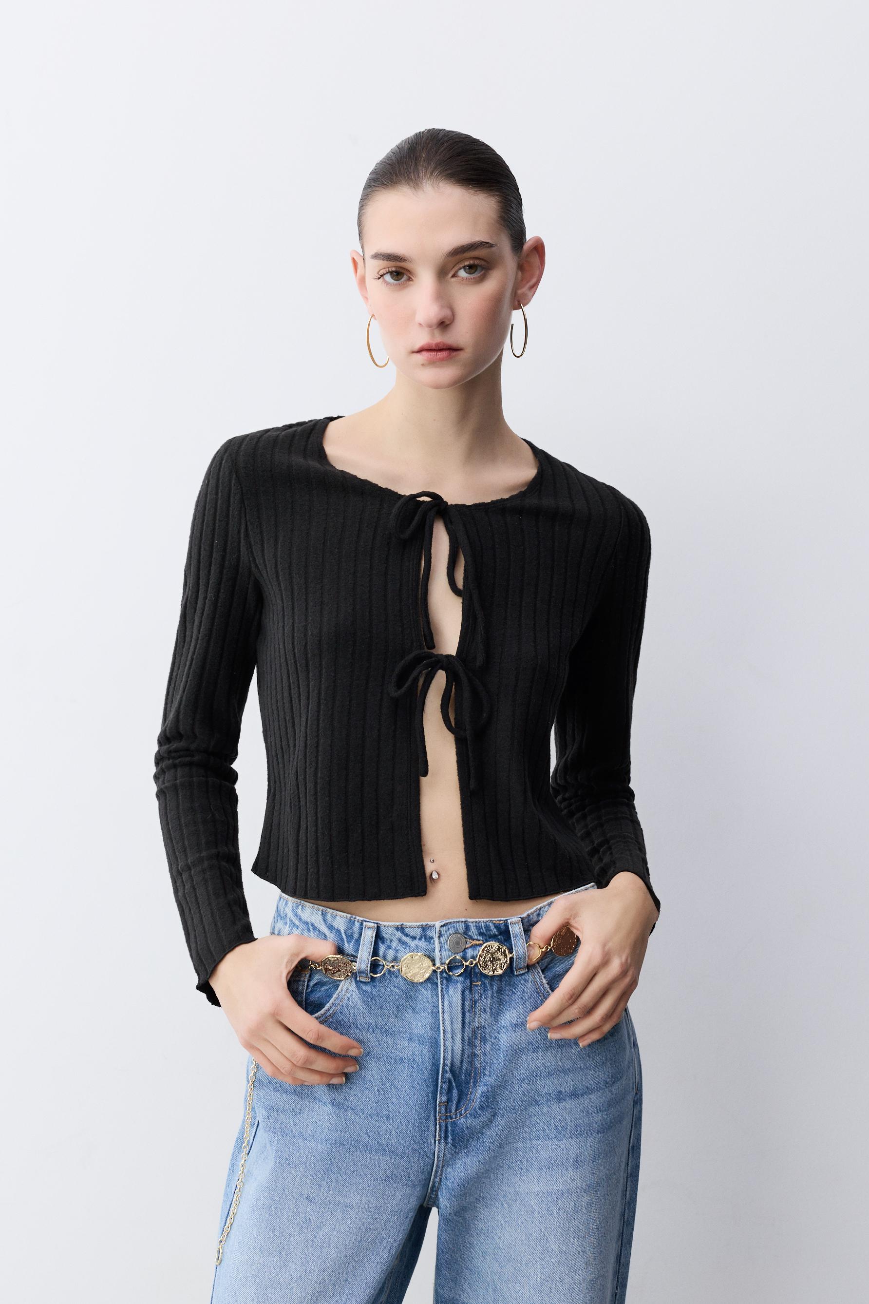 Chaqueta lazadas punto cortado