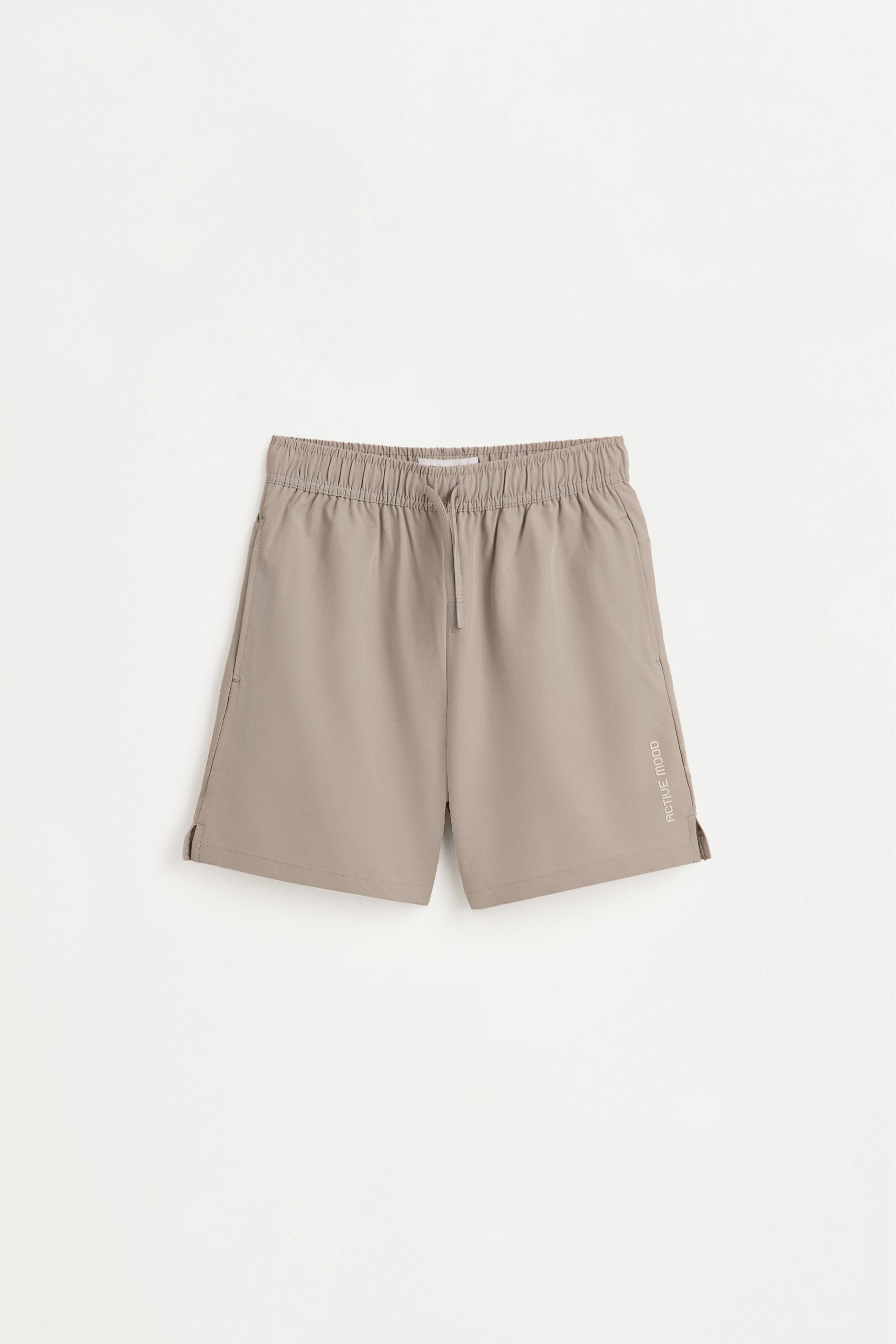 Bermuda sports shorts — SAND