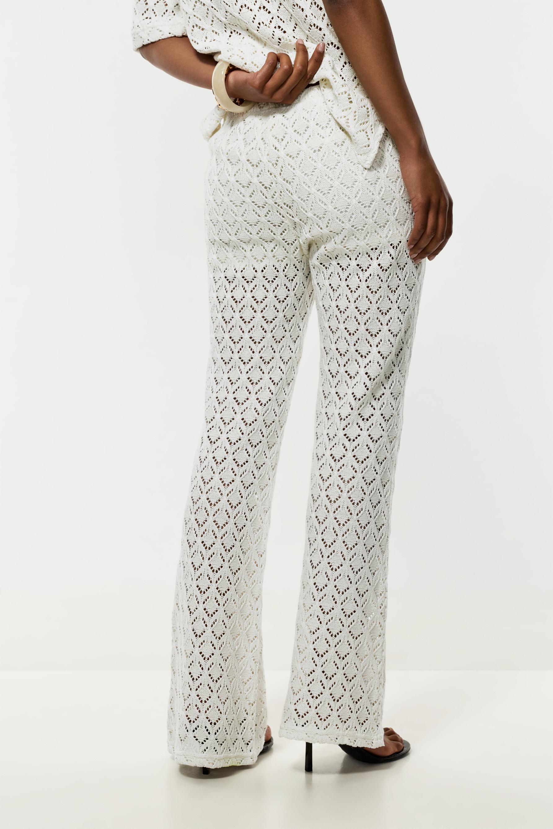 Crochet-effect bell bottom trousers — OFF WHITE