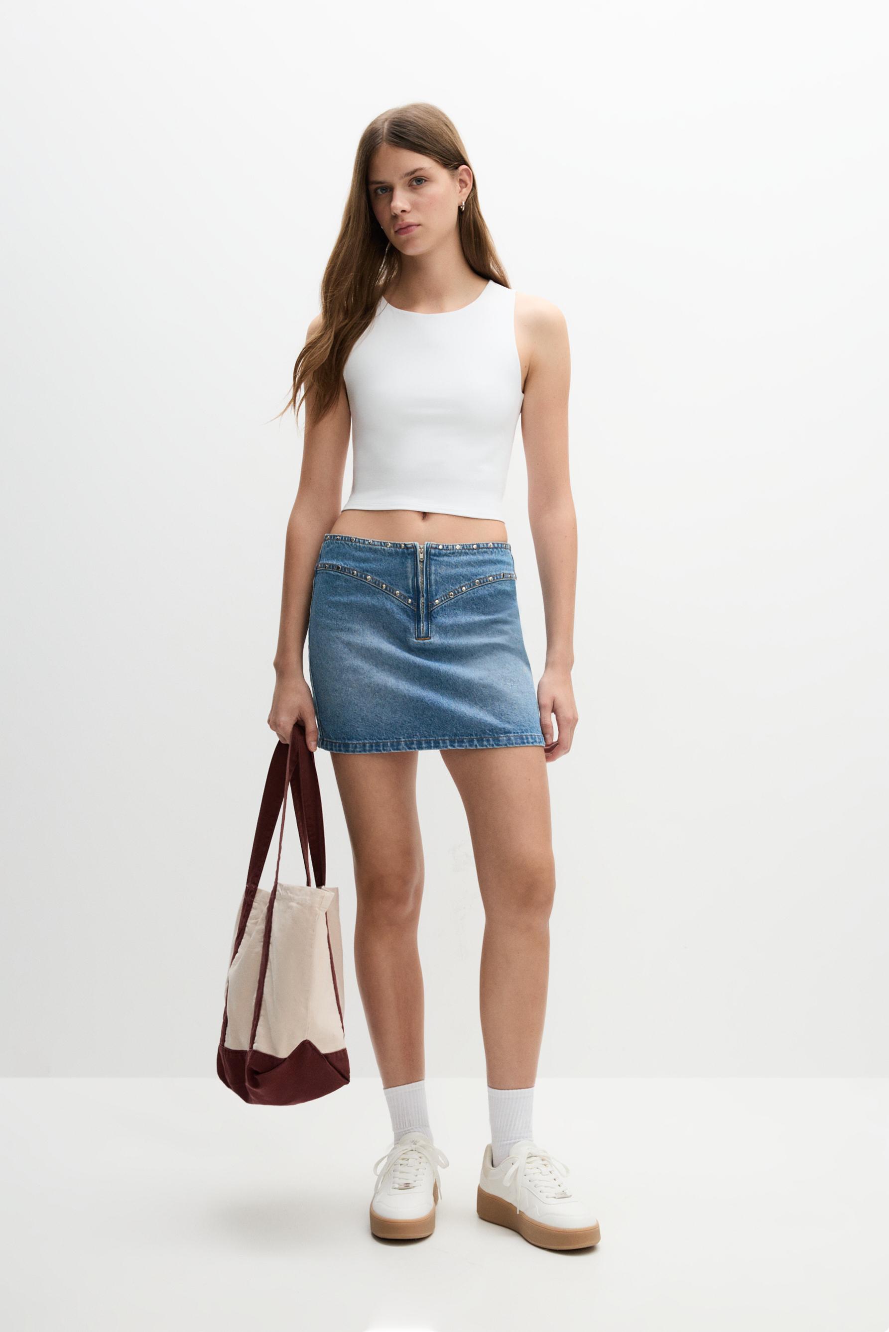 Falda denim tachas