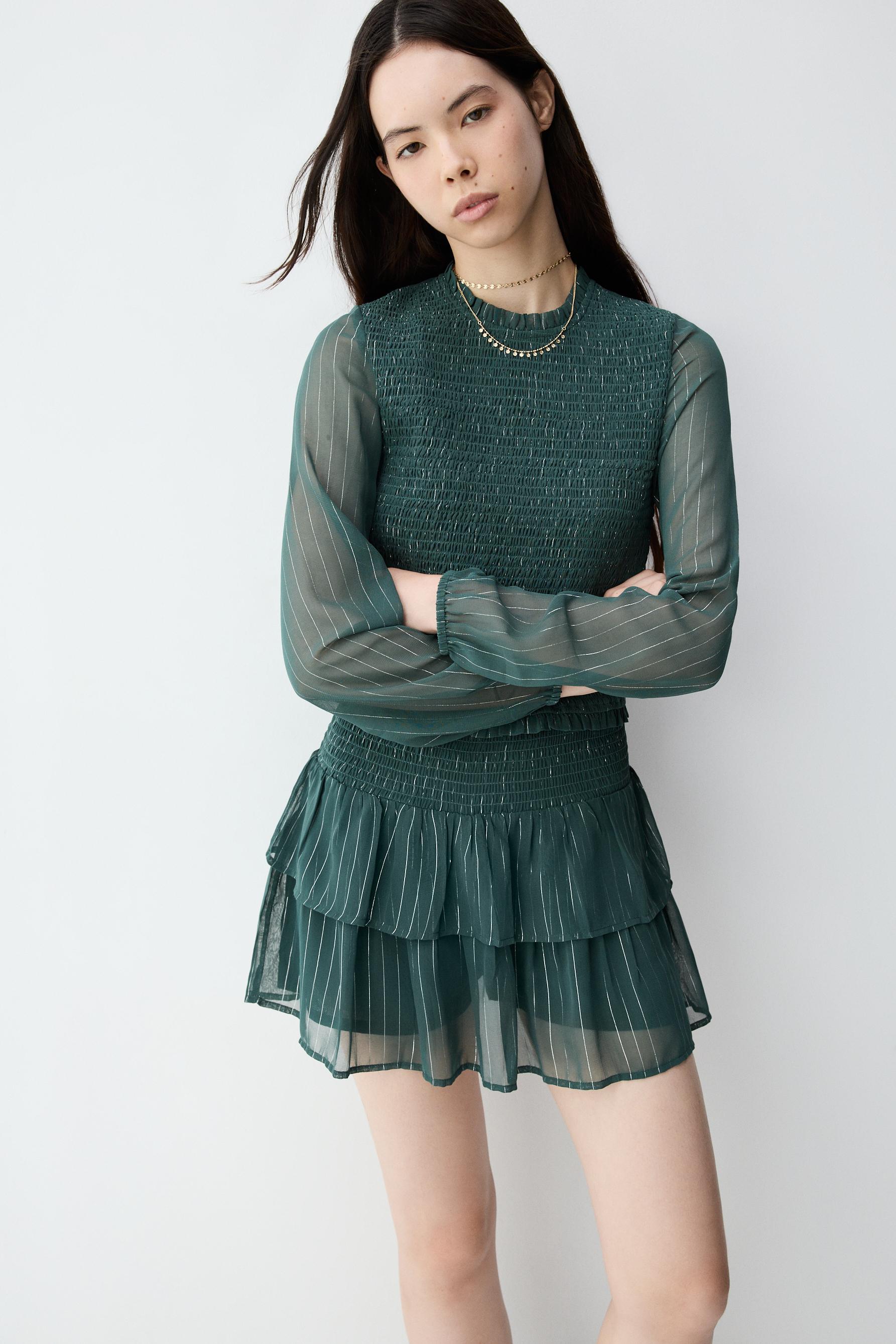 Blusa hilatura metalizada