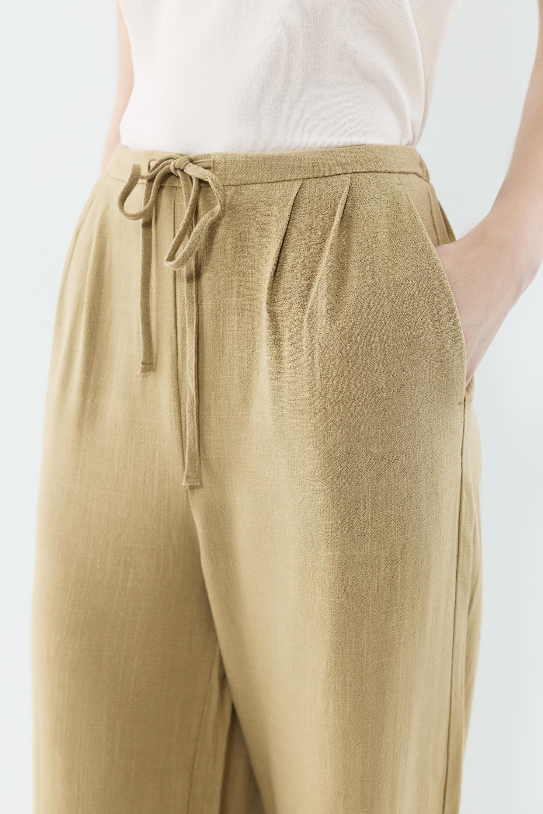 Rustic wide-leg trousers — PALE KHAKI